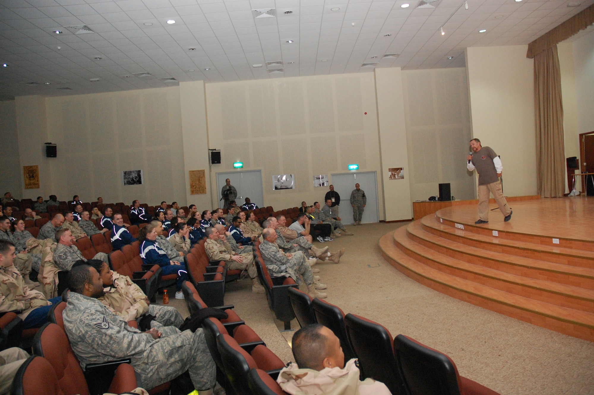 Tom Foss, a comedian on the Comics on Duty World Tour, entertains Airmen Jan. 15, 2007, during a show at an air base in the Persian Gulf Region. (U.S. Air Force photo/Capt Jason L. McCree) (Released)