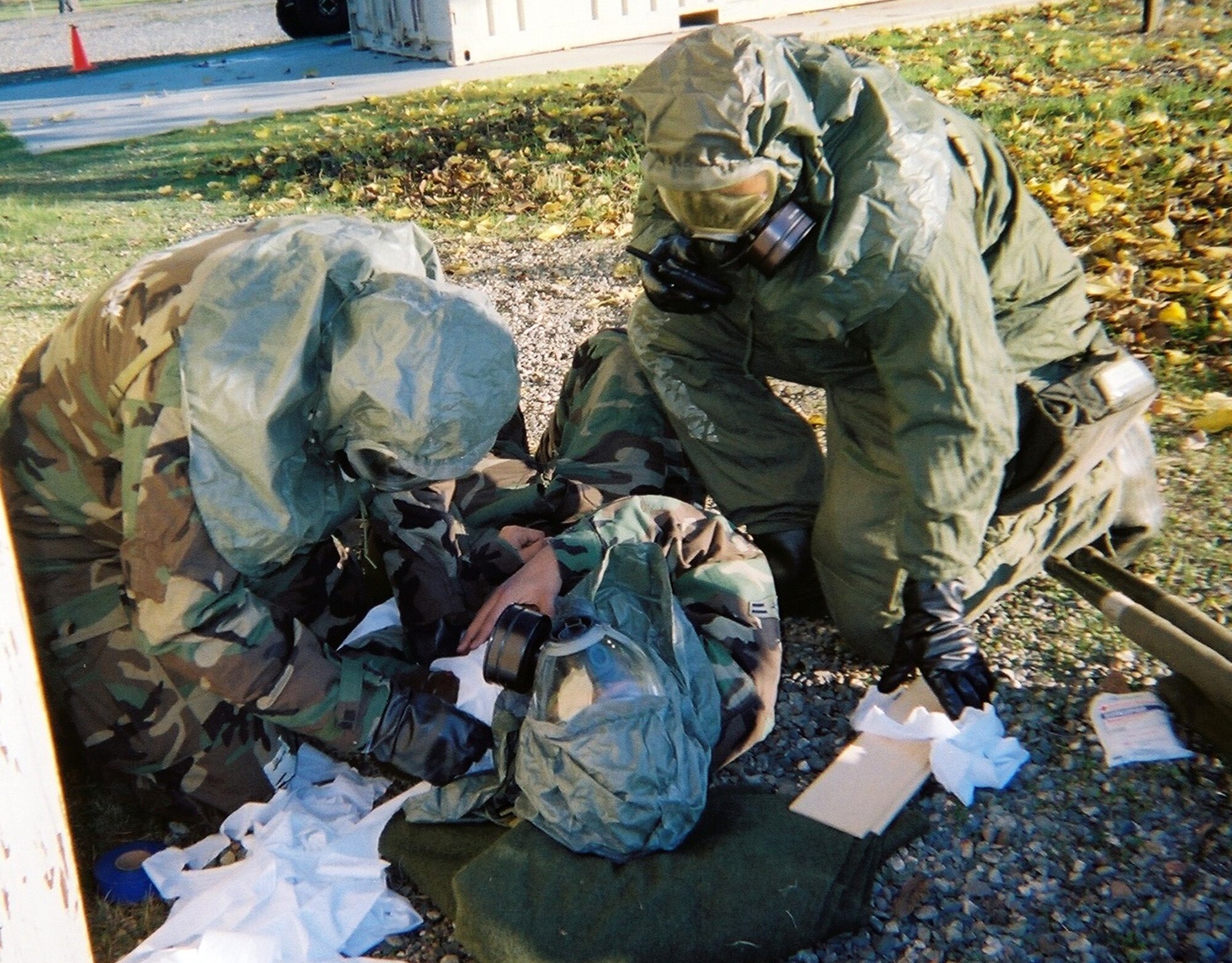 BEALE AIR FORCE BASE, CALIF. --Air Force Reservists assigned to the 940th Air Refueling Wing here stabilize a "wounded" warrior during a self aid and buddy care  evaluation Dec. 8, 2007. Wing Reservists were practicing their survival skills in preparation for a February 2008 operational readiness inspection. A variety of "wounded" individuals were expertly moulaged to simulate the full spectrum of battlefield injuries. Tech. Sgt. Barbara Mateus, 940th SABC instructor/evaluator said the Airmen were being tested on their ability to engage and help while maintaining the safety of everyone. "It was great hands on training," she said. "It made them think about prioritizing between helping and being safe." (U.S. Air Force photo/Tech. Sgt. Barbara Mateus)