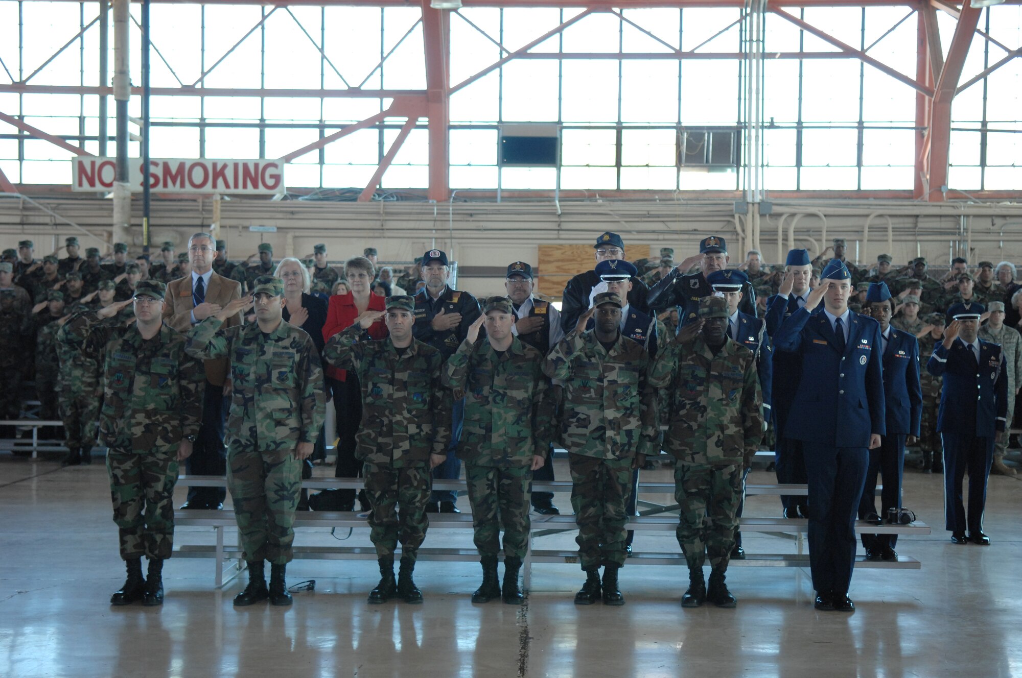 Members of Team Holloman and visitors from Alamogordo, White Sands and Las Cruces stand during the playing of the national anthem during the 49th Fighter Wing change of command ceremony Jan. 11, 2008, at Holloman Air Force Base, N.M. The ceremony was attended by members of Team Holloman and visitors from Alamogordo, White Sands and Las Cruces, N.M., and Fort Bliss, Texas.
(U.S. Air Force photo/Senior Airman Anthony Nelson Jr)
