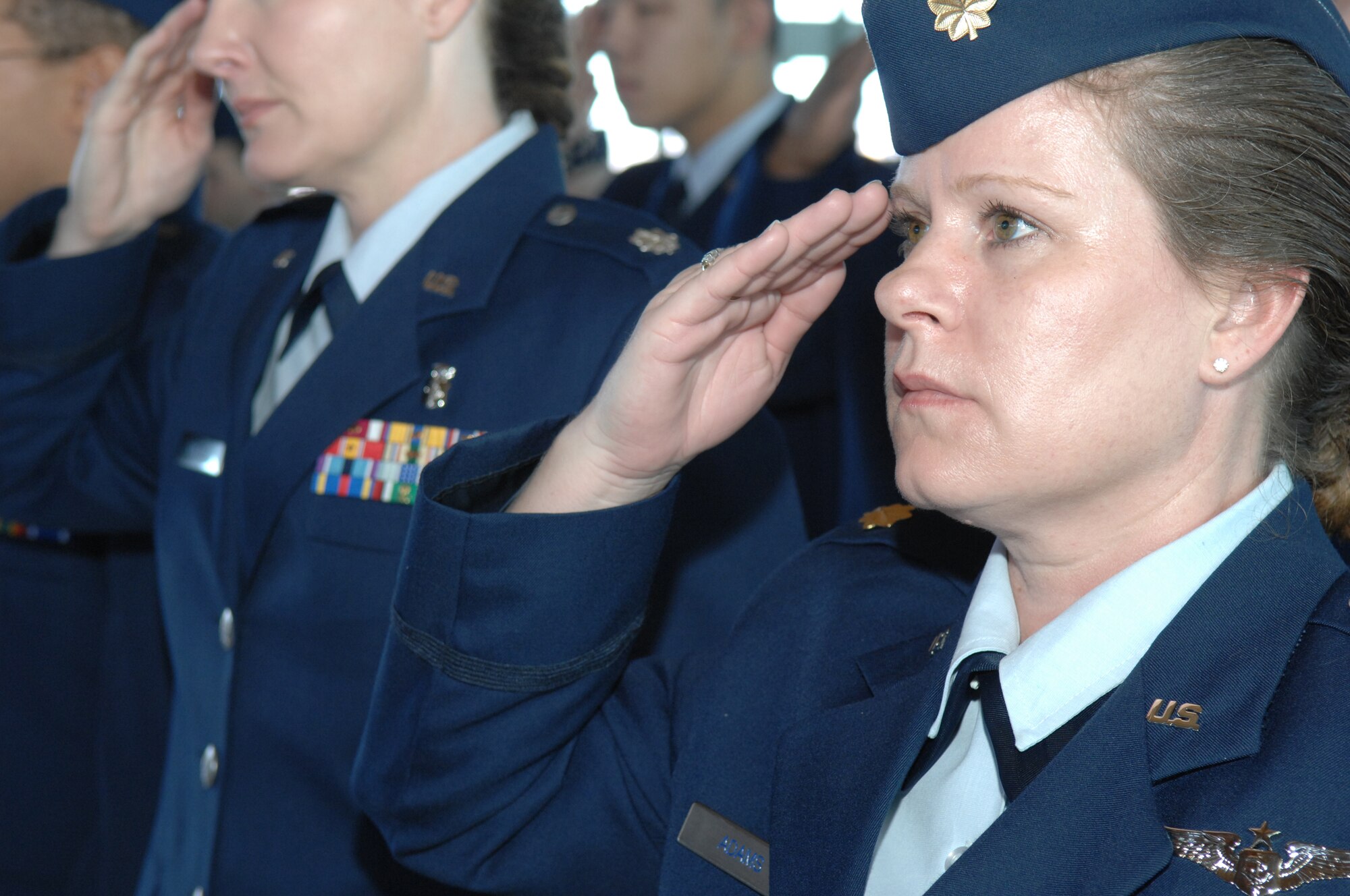 Major Dana Adams,49th Medical Operations Squadron, Women's health specialty clinic, flight commander renders a salute during the 49th Fighter Wing change of command ceremony Jan. 11, 2008, at Holloman Air Force Base, N.M. The ceremony was attended by members of Team Holloman and visitors from Alamogordo, White Sands and Las Cruces, N.M., and Fort Bliss, Texas. (U.S. Air Force photo/Senior Airman Anthony Nelson Jr) 