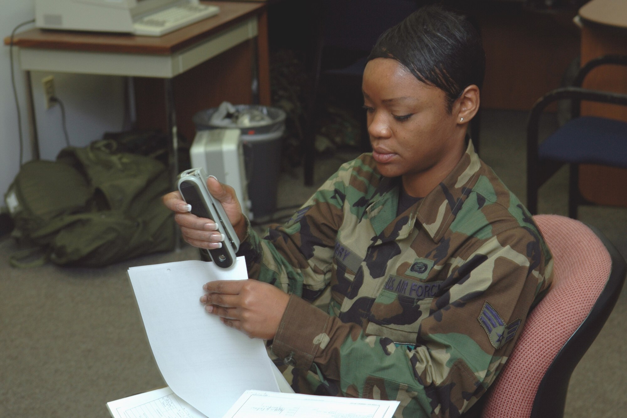 GRISSOM AIR RESERVE BASE, Ind., -- Senior Airman Kameika Embry, a personnel specialist with the 434th Aircraft Maintenance Squadron, prepares information files to be sorted and filed during a recent unit training assembly.  Personnel such as Airman Embry play an important role to ensure files and documents are current and maintained in accordance with Air Force standards. (U.S. Air Force photo/Senior Airman Chris Bolen)