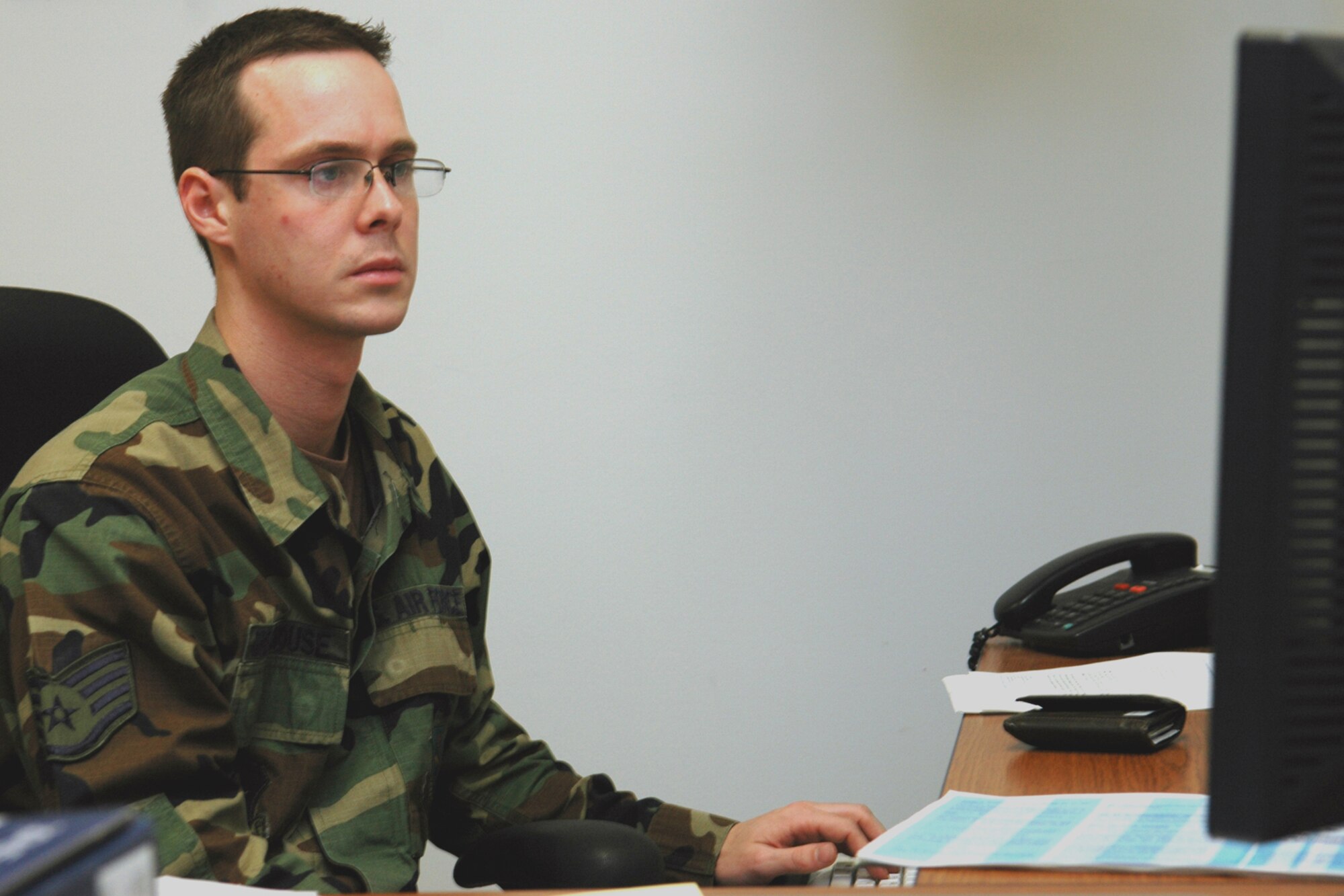 GRISSOM AIR RESERVE BASE, Ind., -- Staff Sgt. Nathan Greathouse a personnel specialist with the 434th Maintenance Squadron, prepares computer data to be used in producing personnel information files during a recent unit training assembly.  (U.S. Air Force photo/Senior Airman Chris Bolen)