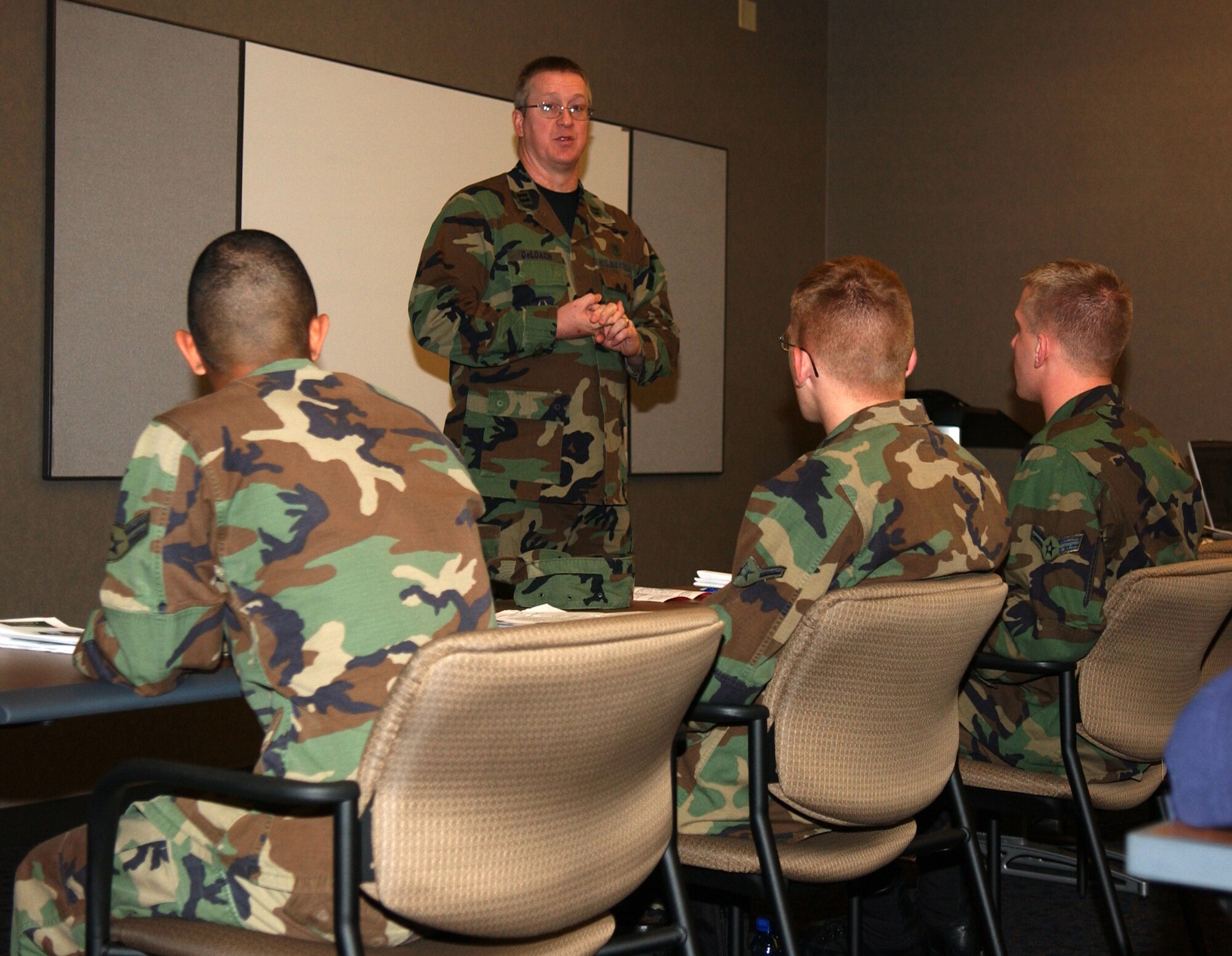 GRISSOM AIR RESERVE BASE, Ind., -- Capt. Curtis Deloach, a clinical social worker with the 434th Aerospace Medicine Squadron, briefs new Airman at Grissom. The briefing is provided monthly as part of the newcomer's orientation program at the base. (Air Force photo/Senior Airman Ben Mota)