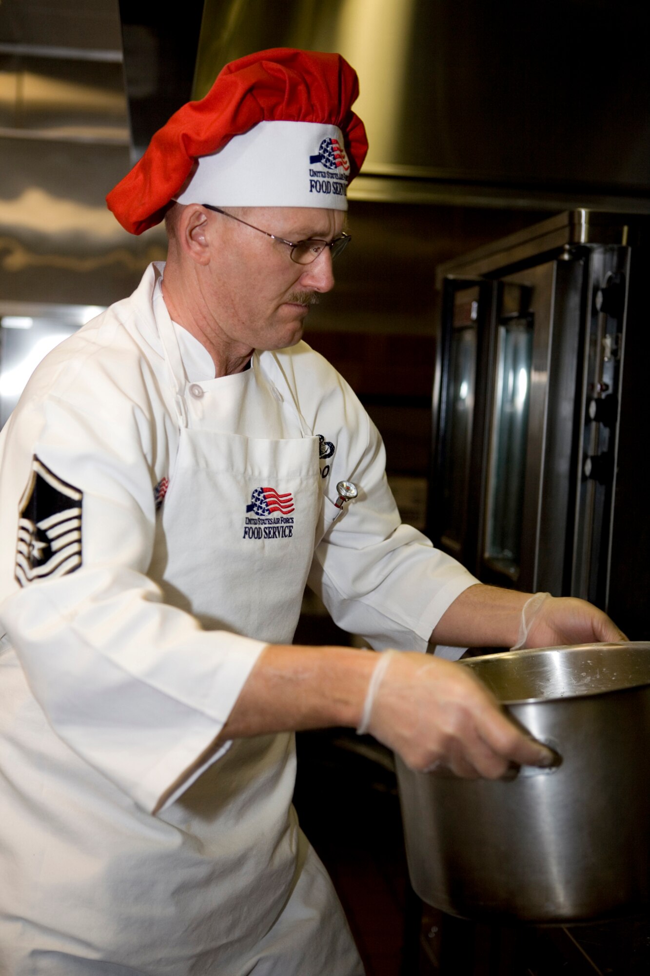 GRISSOM AIR RESERVE BASE, Ind.-- Master Sgt. Timothy Wood, 434th Services Flight food services supervisor, makes a gravy topping for the turkey that will be served for dinner. Services supervisors maintain proficiency by helping out in the kitchen whenever possible. Services will be competing for the John L. Hennessy Trophy which is awarded to the best food-service program in the Air Force.  (U.S. Air Force photo/Senior Omar Delacruz)