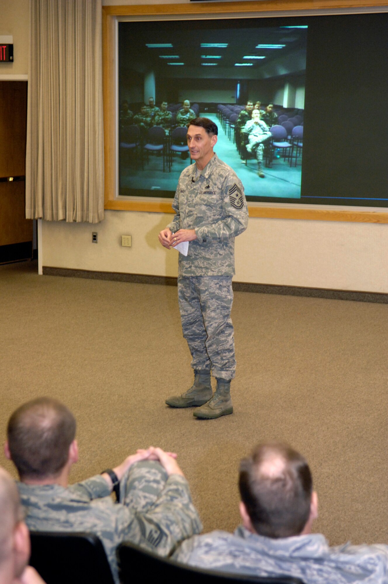 Chief Master Sergeant Jonathan Hake, command chief for the Air Force Materiel Command, speaks with the Hanscom enlisted force at the Lexington Amphitheater Wednesday. Chief Hake, who is retiring Feb. 1 after nearly 30 years of Air Force service, also hosted a lunch with enlisted personnel, spent time with the Band of Liberty and met with others during what will be his last official visit to the base.  (U.S. Air Force photo by Mark Wyatt)

