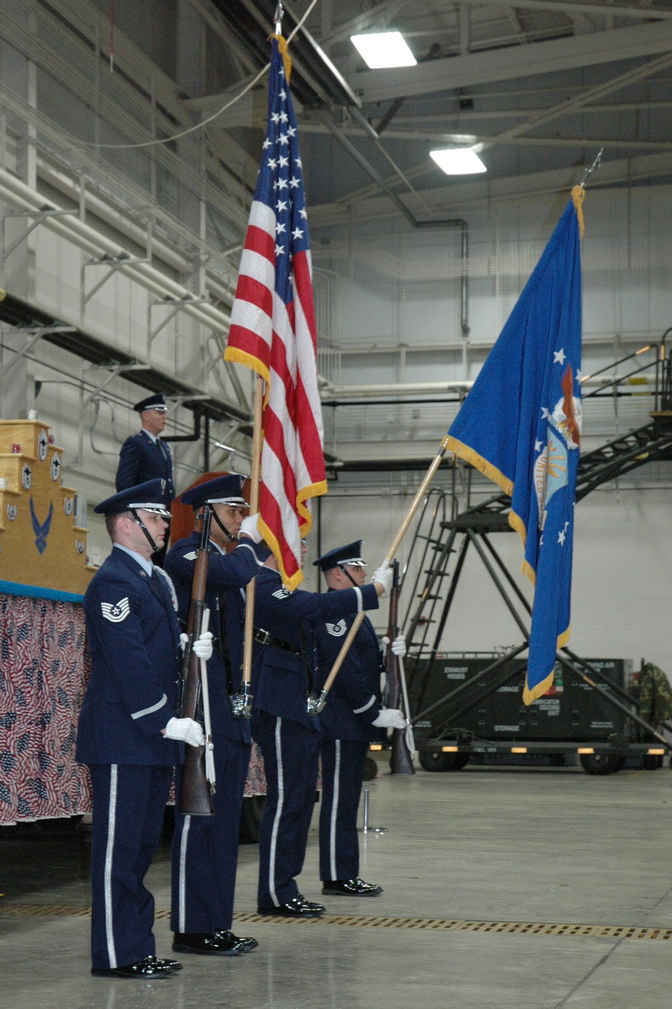 YOUNGSTOWN AIR RESERVE STATION, Ohio — Members of the 910th Airlift Wing Honor Guard present the Colors during the singing of the National Anthem at the retirement ceremony for Chief Master Sgt. Robert V. Glus Sr., command chief master sergeant of the 910th Airlift Wing, Jan. 6, 2008. U.S. Air Force photo/Tech. Sgt. Bob Barko Jr.