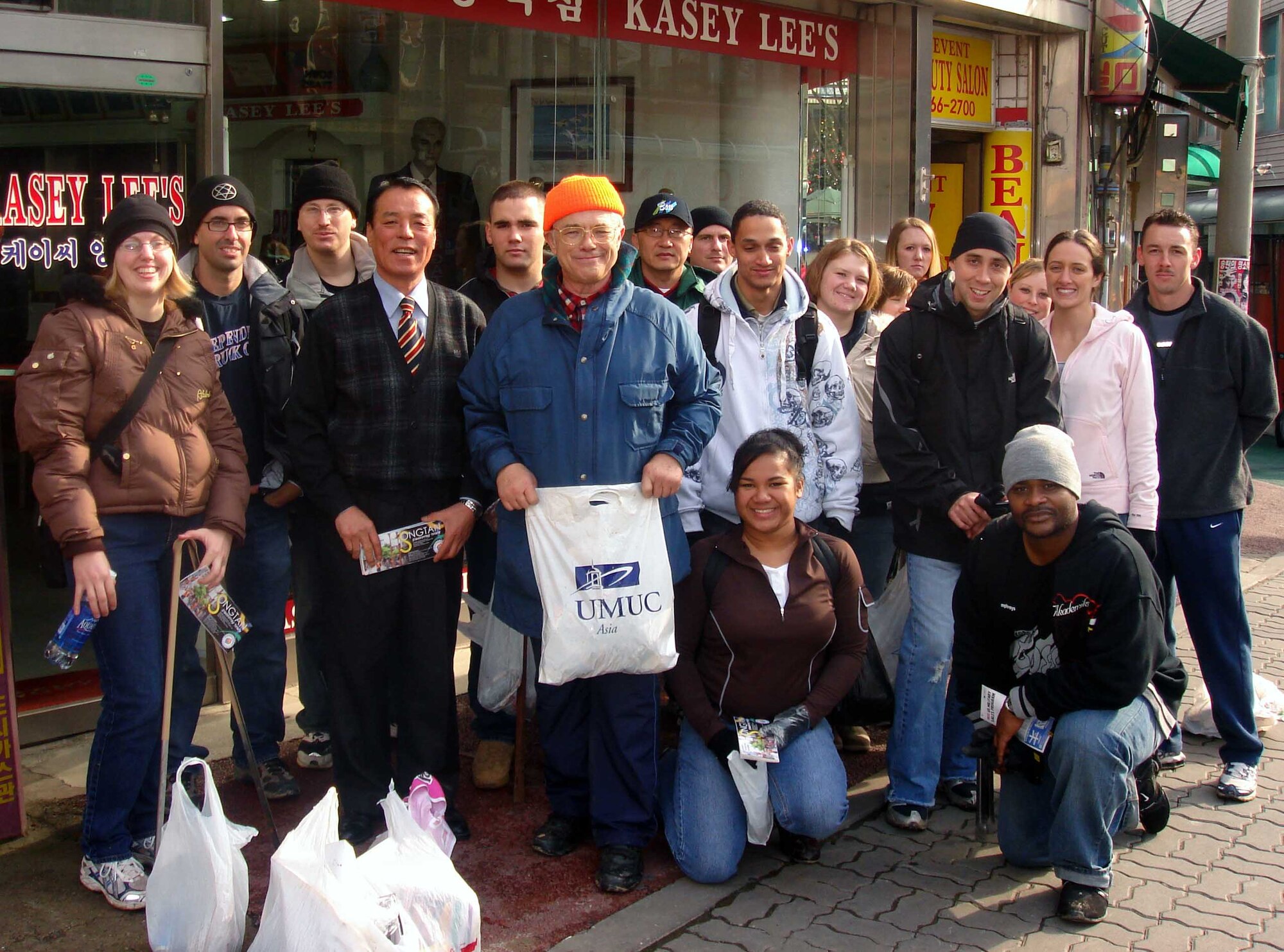 Troops for Trash participants pose for a picture after completing their six-mile Buraksan Trail hike, picking up trash along the way. The participants earned volunteer hours in addition to learning more about Korean culture. (Courtesy photo)