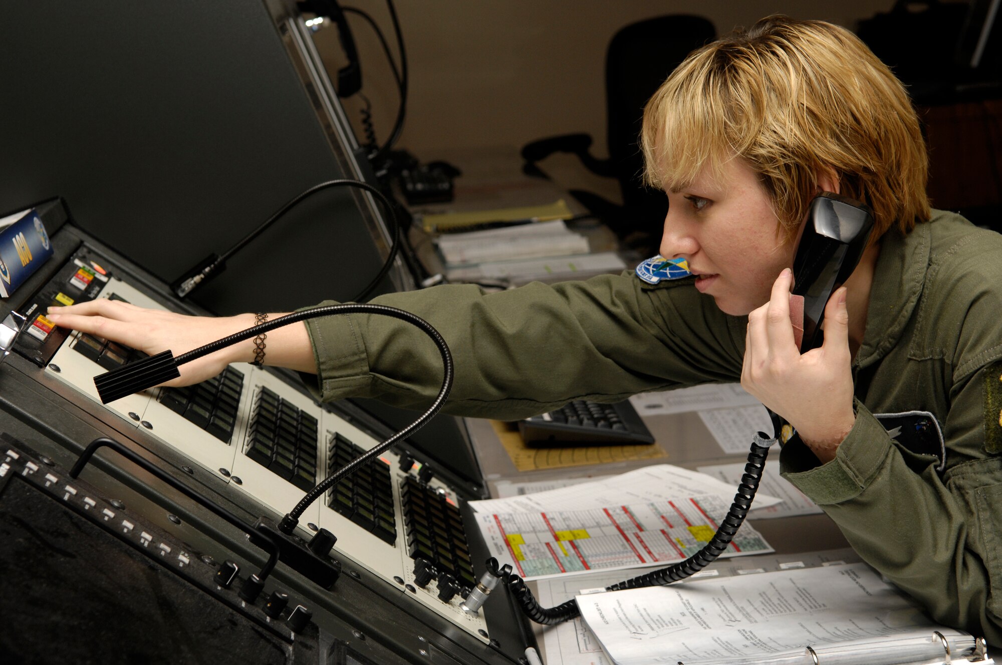 VANDENBERG AIR FORCE BASE, Calif. -- Senior Airman Jillian Voyles, a 2nd Range Operations Squadron aerospace control officer, uses the status and alert lights during a training scenario on Jan. 14. Aerospace control officers ensure launch hazard areas are clear of boats, trains, aircraft, and personnel on oil rigs during launch operations. The scenario is the deciding factor on who is selected to be on the elite 30th Space Wing Guardian Challenge Team. Air Force Space Command hails GC as the only space war fighter competition in the Air Force. The competition pits the "best of the best" space war fighters against each other, determining the top space wing teams in the Air Force. The event captures the essence of competition through rigorous evaluation and increases the overall capabilities of operations teams to perform their missions. (U.S. Air Force photo/Airman 1st Class Christian Thomas)
