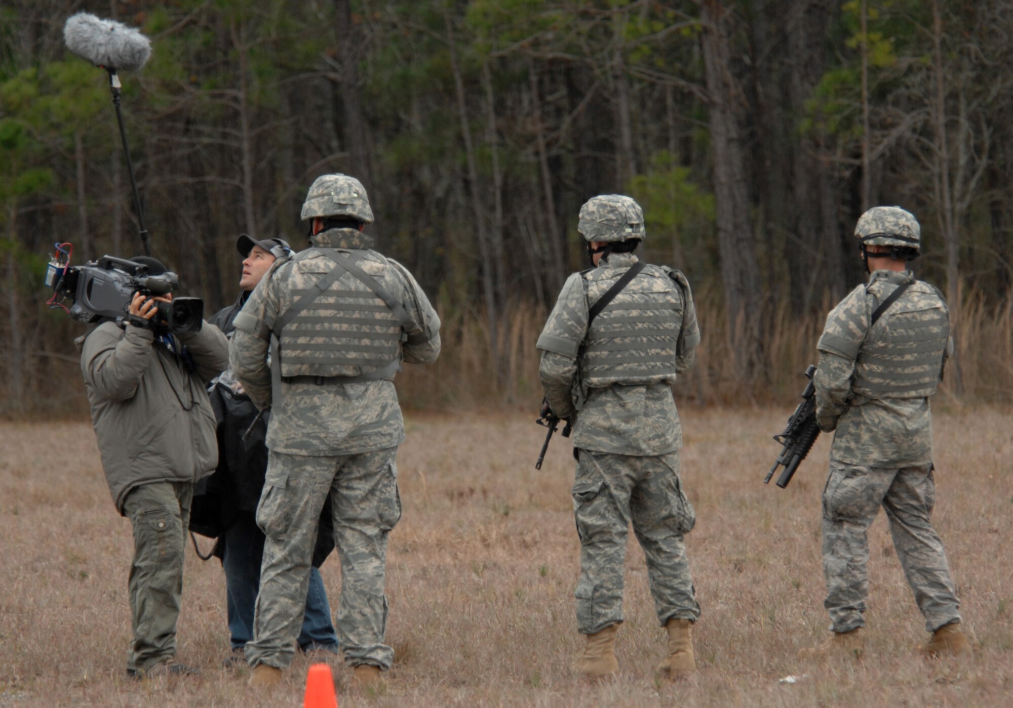 MOODY AIR FORCE BASE, Ga. -- Airmen with the 820th Security forces Group perform scenarios for a team from the CBS news magazine 60 Minutes here Jan. 12 . The film crew was here to cover the Active Denial System for an upcoming segment. (U.S. Air Force photo by Airman 1st Class Gina Chiaverotti)