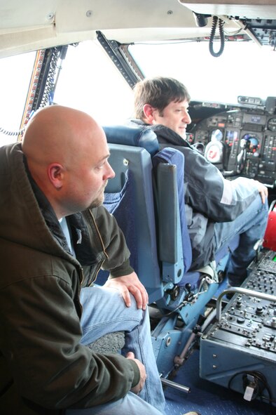 WRIGHT-PATTERSON AFB, Ohio - Ghost Hunters Jason Hawes and Grant Wilson check out the flight deck of the 445th Airlift Wing's C-5 Galaxy. The popular Sci Fi Channel T.V. show Ghost Hunters is filming their show in several buildings at Wright-Patterson AFB and filmed some footage of the 445th Airlift Wing's C-5 Galaxy Jan. 15, 2008, to help enhance the Air Force base setting for the show. (U.S. Air Force photo/Maj. Ted Theopolos)