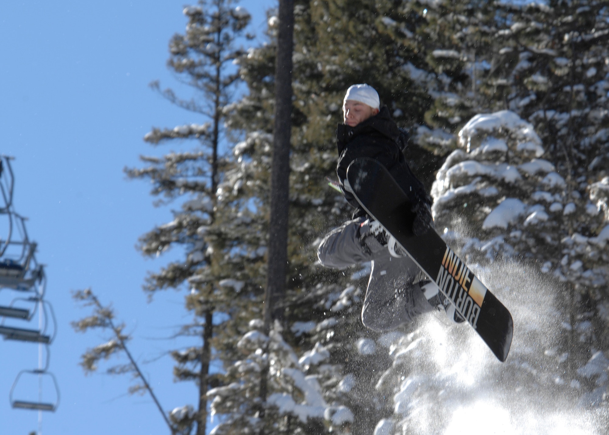 CANNON AIR FORCE BASE, N.M. - Airman 1st Class Alex Schatzman, 27th Special Operations Logistics Readiness Squadron, does a Method Air at Sipapu Ski Resort, N.M. on Jan. 12.  Sipapu Ski Resort is offering free lift tickets for servicemembers for the duration of the ski season. (U.S. Air Force photo by Airman 1st Class Erik Cardenas)
