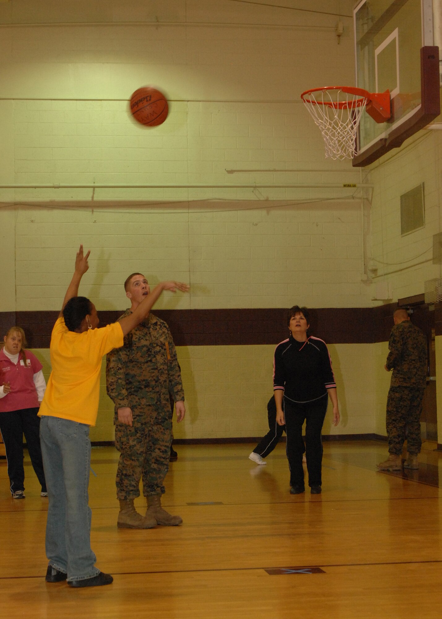 SEYMOUR JOHNSON AIR FORCE BASE, N.C. - Tilesha Atkinson, Wayne Opportunity Program, competes in the 2008 Special Olympics on January 16. Tilesha Atkinson participates in many activities during the Special Olympics as well as helping others.(U.S. Air Force photo by Airman 1st Class Jonathon Williams)(released)