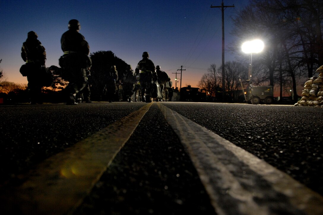 LANGLEY AIR FORCE BASE, Va.-- More than 2,000 Airmen travel into Raptor Town Jan. 16 during a Phase II Operational Readiness Exercise. During the exercise, Airmen prepared for March's Operational Readiness Inspection, which will test their ability to survive and operate in a deployed environment. (U.S. Air Force photo/Airman 1st Class Vernon Young)