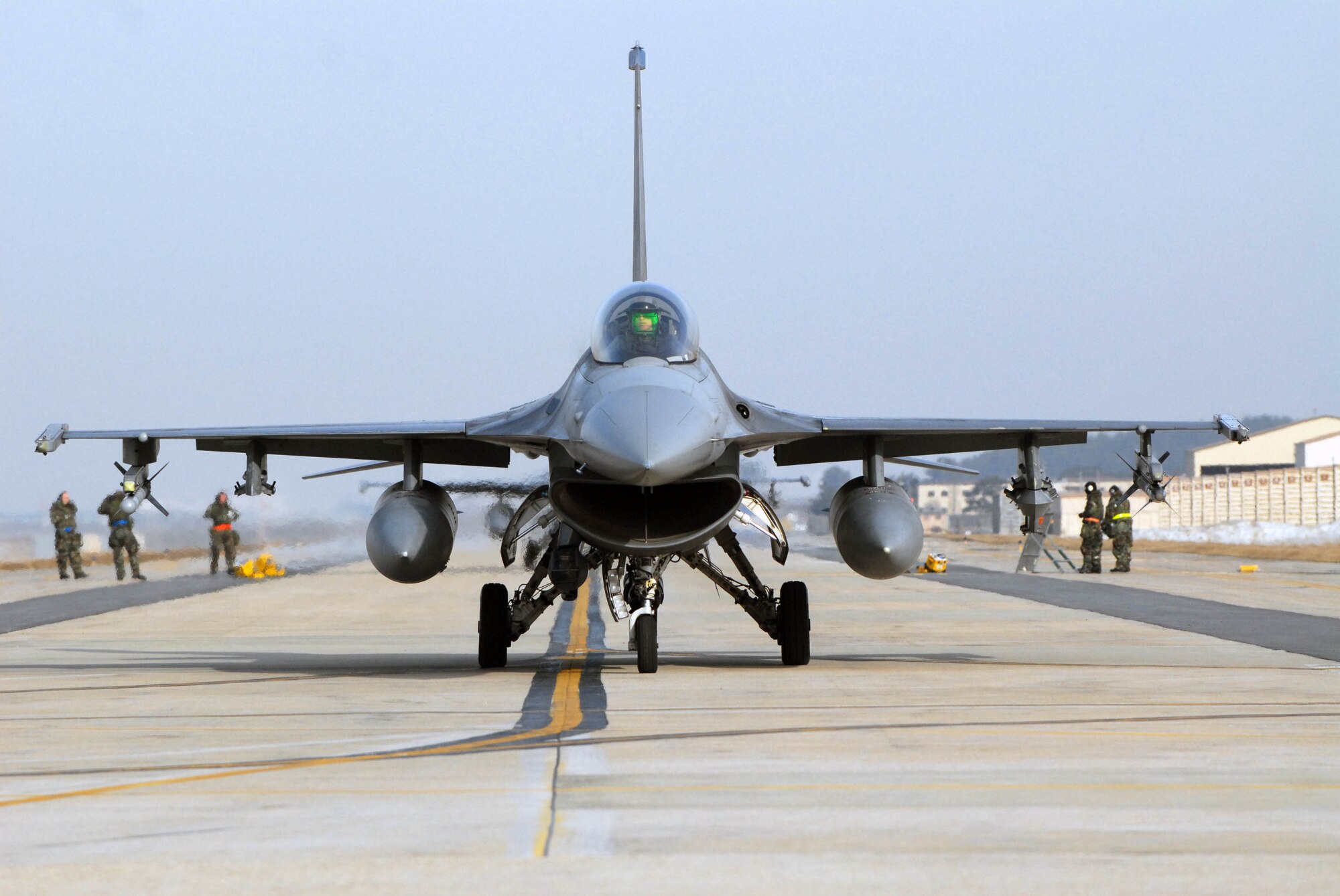 KUNSAN AIR BASE, South Korea -- An F-16 Fighting Falcon from the 35th Fighter Squadron taxi's on the runway for joint flying operations during the peninsula wide operations readiness exercise here Jan. 17. The exercise is conducted to ensure members of the Wolf Pack remain ready to execute its mission of "Defending the Base, Accepting Follow on Forces and Taking the Fight North." (U.S. Air Force photo/Senior Airman Steven R. Doty)