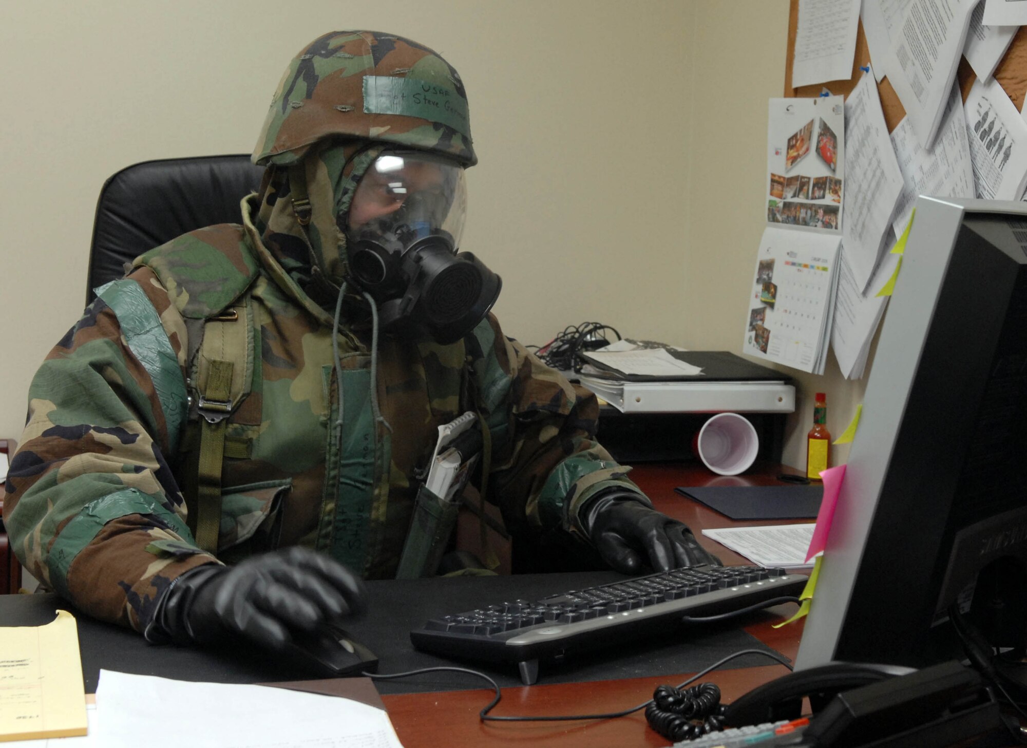 KUNSAN AIR BASE, South Korea -- Technical Sgt. Steve German, American Forces Network non commissioned officer in charge, ensures all necessary information is disseminated over the radio during the peninsula wide operations readiness exercise here Jan. 17. The exercise is conducted to ensure members of the Wolf Pack remain ready to execute its mission of "Defending the Base, Accepting Follow on Forces and Taking the Fight North." (U.S. Air Force photo/Senior Airman Steven R. Doty)