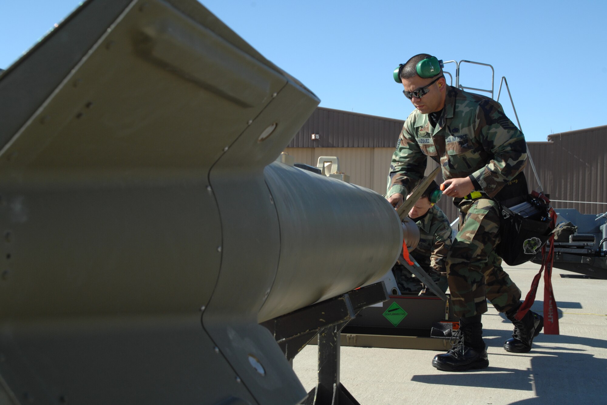 Staff Sgt. Alberto Vazquez, 49th Aircraft Maintenance Squadron, preps a GBU-27 during  a F-117A Weapons Load Crew of the Year Competition Jan. 18, 2008, at Holloman Air Force Base, N.M. The competition is the last for the F-117A as Holloman is scheduled to retire the Nighthawk and bring in the F-22A Raptor. (U.S. Air Force photo/Airman 1st Class Jamal D. Sutter)