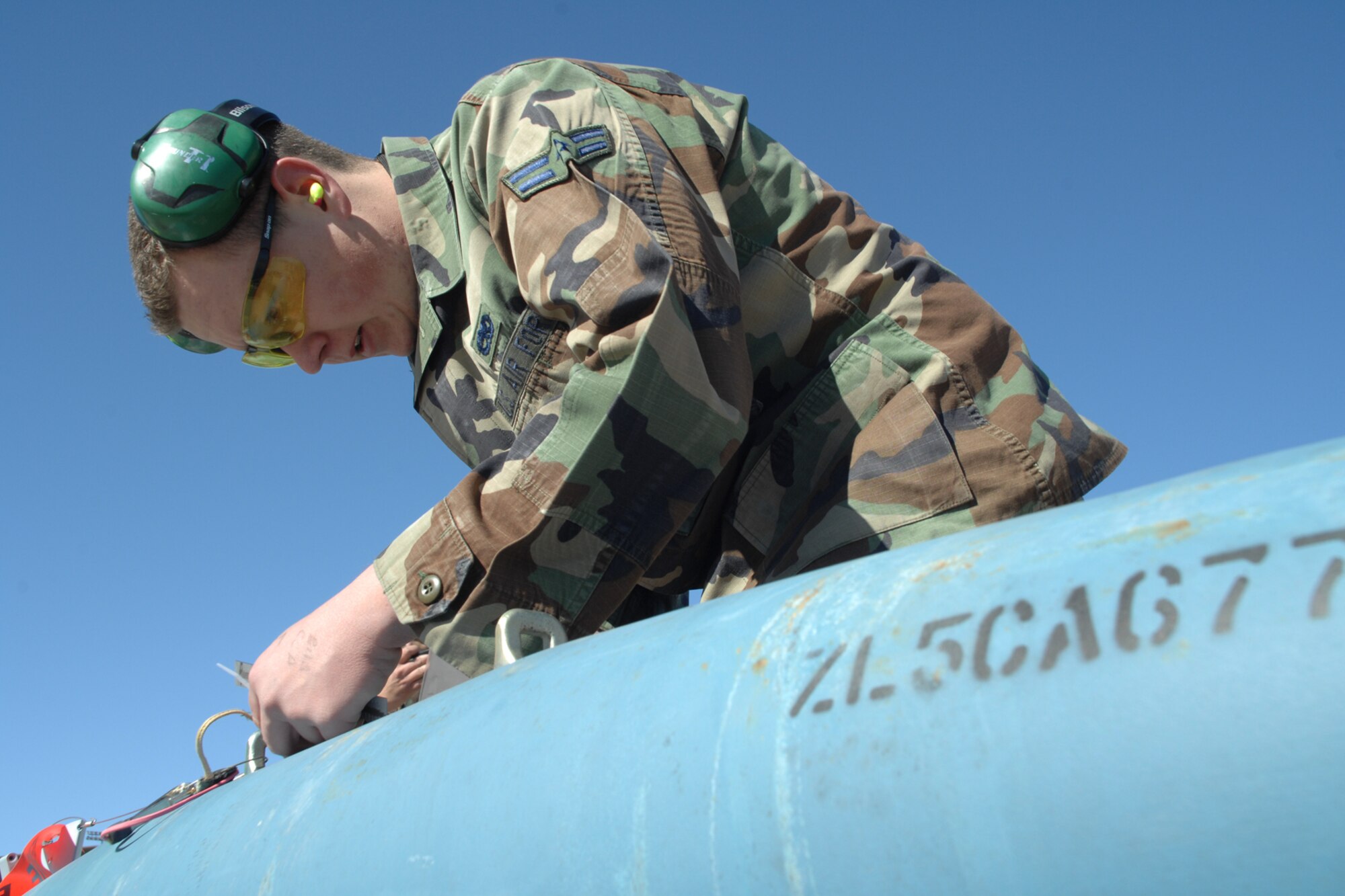 Airman 1st Class Ray Wornat, 49th Aircraft Maintenance Squadron, works on a GBU-12, a 500 pound  general purpose iron bomb, during a F-117A Weapons Load Crew of the Year Competition Jan. 18, 2008, at Holloman Air Force Base, N.M. The competition places the four best weapons load crews (two from the 8th Aircraft Maintenance Unit and two from the 9th Aircraft Maintenance Unit) against each other to determine who the best load crew of the year is. (U.S. Air Force photo/Airman 1st Class Jamal D. Sutter)