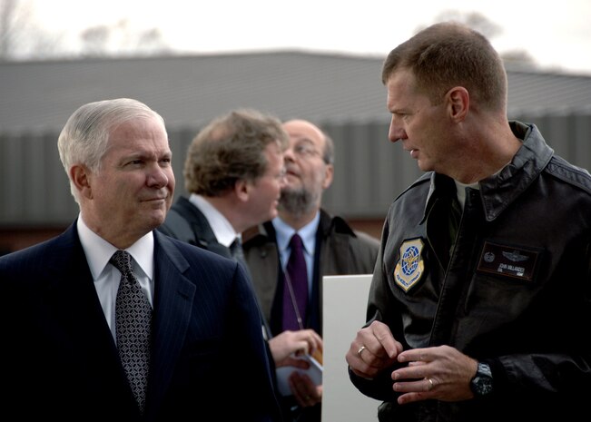 Col. John "Red" Millander, 437th Airlift Wing commander, Charleston AFB, S.C., talks with the Secretary of Defense, The Honorable Robert Gates, on the Charleston AFB flightline Jan. 18.  The secretary viewed the loading procedures of the Mine Resistant Ambush Protected Vehicles on a C-17 aircraft, and he also toured the integration, testing and installation of advanced electronic systems on the MRAP vehicles at the Space and Naval Warfare Systems Center Charleston, S.C. (U.S. Air Force photo/Airman 1st Class Katie Gieratz)