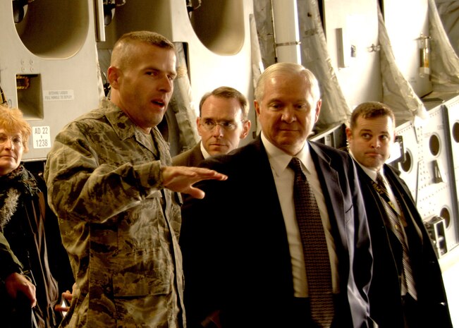 Maj. Chad Morris, 437th Aerial Port Squadron, Charleston AFB, S.C., explains the APS role in the loading of Mine Resistant Ambush Protected Vehicles onto a C-17 aircraft to the Secretary of Defense, The Honorable Robert Gates, on the Charleston AFB flightline Jan. 18. (U.S. Air Force photo/Airman 1st Class Katie Gieratz)