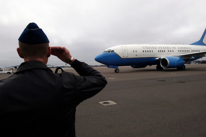 Col. John "Red" Millander, 437th Airlift Wing commander, Charleston AFB, S.C., salutes the Secretary of Defense, The Honorable Robert Gates upon his arrival to Charleston AFB, Jan. 18.  The secretary viewed the loading procedures of the Mine Resistant Ambush Protected Vehicles on a C-17 aircraft, and he also toured the integration, testing and installation of advanced electronic systems on the MRAP vehicles at the Space and Naval Warfare Systems Center Charleston, S.C. (U.S. Air Force photo/Senior Airman Nicholas Pilch)