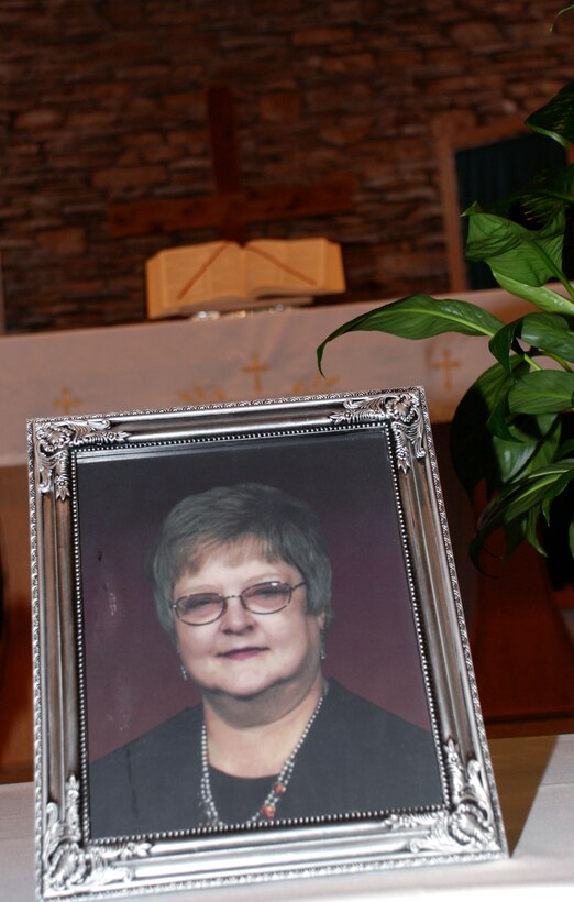 A picture of Tandy Weaver, 82nd Contracting Squadron director of buisness operations, sits at the North Chapel during a memorial service in her honor Jan. 18. Ms. Weaver passed away Jan. 12. (U.S. Air Force photo/Airman 1st Class Jacob Corbin)