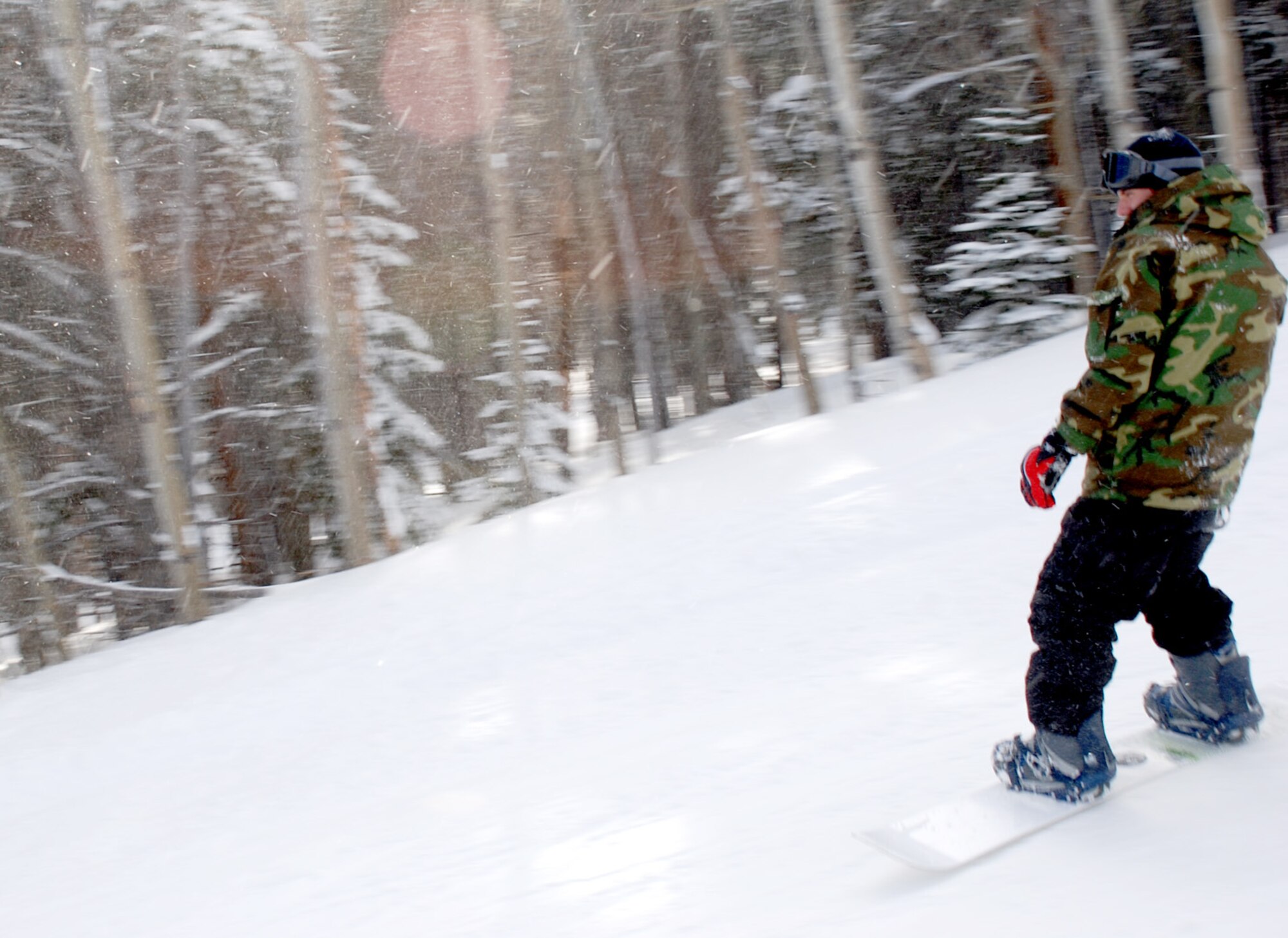 Nicholas Preston, son of 30th Airlift Squadron first sergeant Master Sgt. Todd Preston, finishes the day snowboarding the intermediate trails of the Snowy Range Ski and Recreation Area Jan. 12.