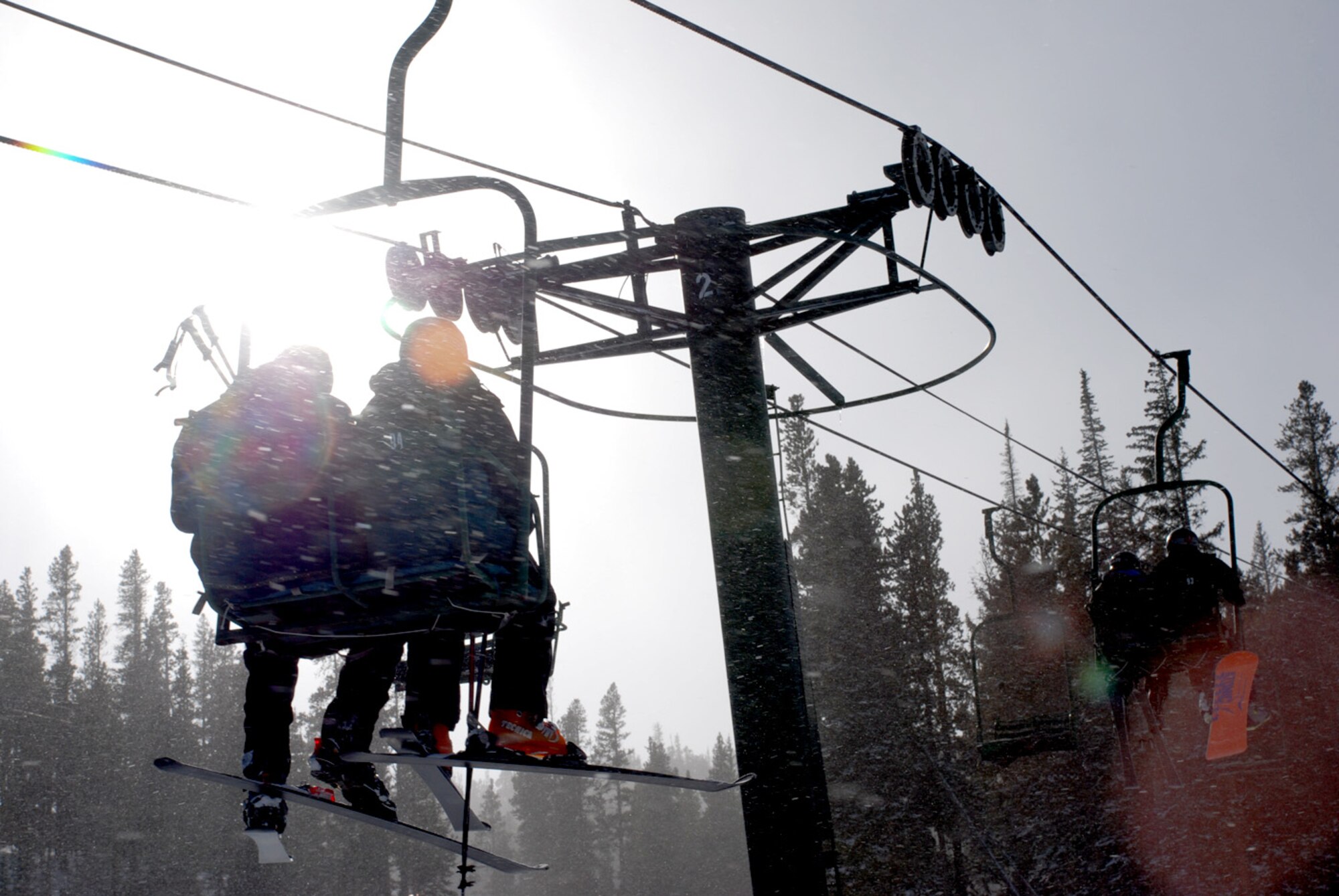 Skiers ride the Virginian chair lift to the easier trails of the Snowy Range ski trip Jan. 12. The Snowy Range area has four operating chair lifts.