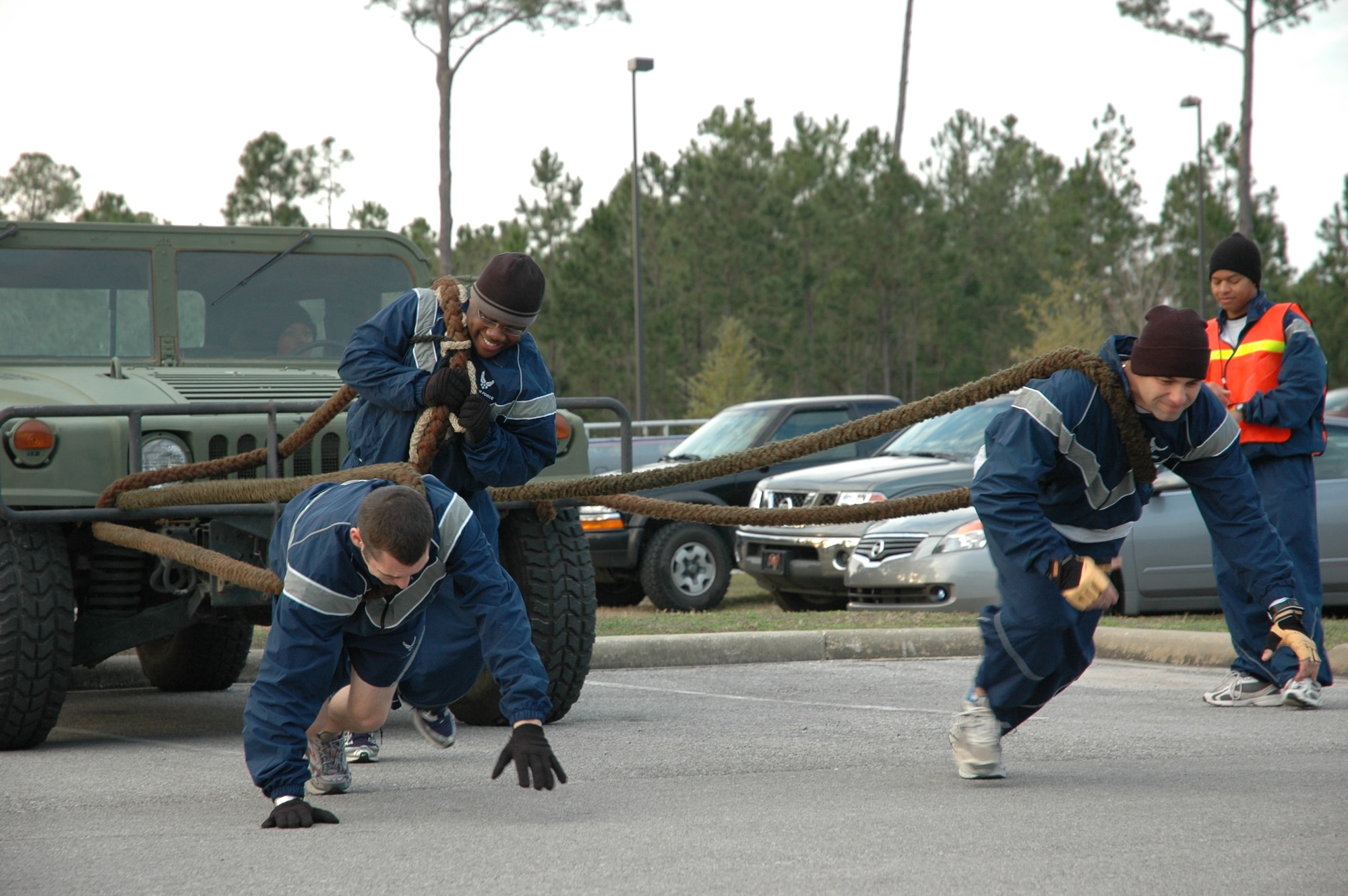 Airmen from the 1st Special Operations Services Squadron pull a 5,900 pound humvee 80 yards as part of the Commando Challenge Jan. 18. The Commando Challenge is an ongoing competition where teams earn points for participation and placement during a series of challenges throughout the year. The winner is presented with the Commander’s Commando trophy. The winner of the day’s event was the 1st Special Operation Security Forces Squadron with a time of 23 seconds. (U.S. Air Force photo/Tech. Sgt. Kristina Newton)
