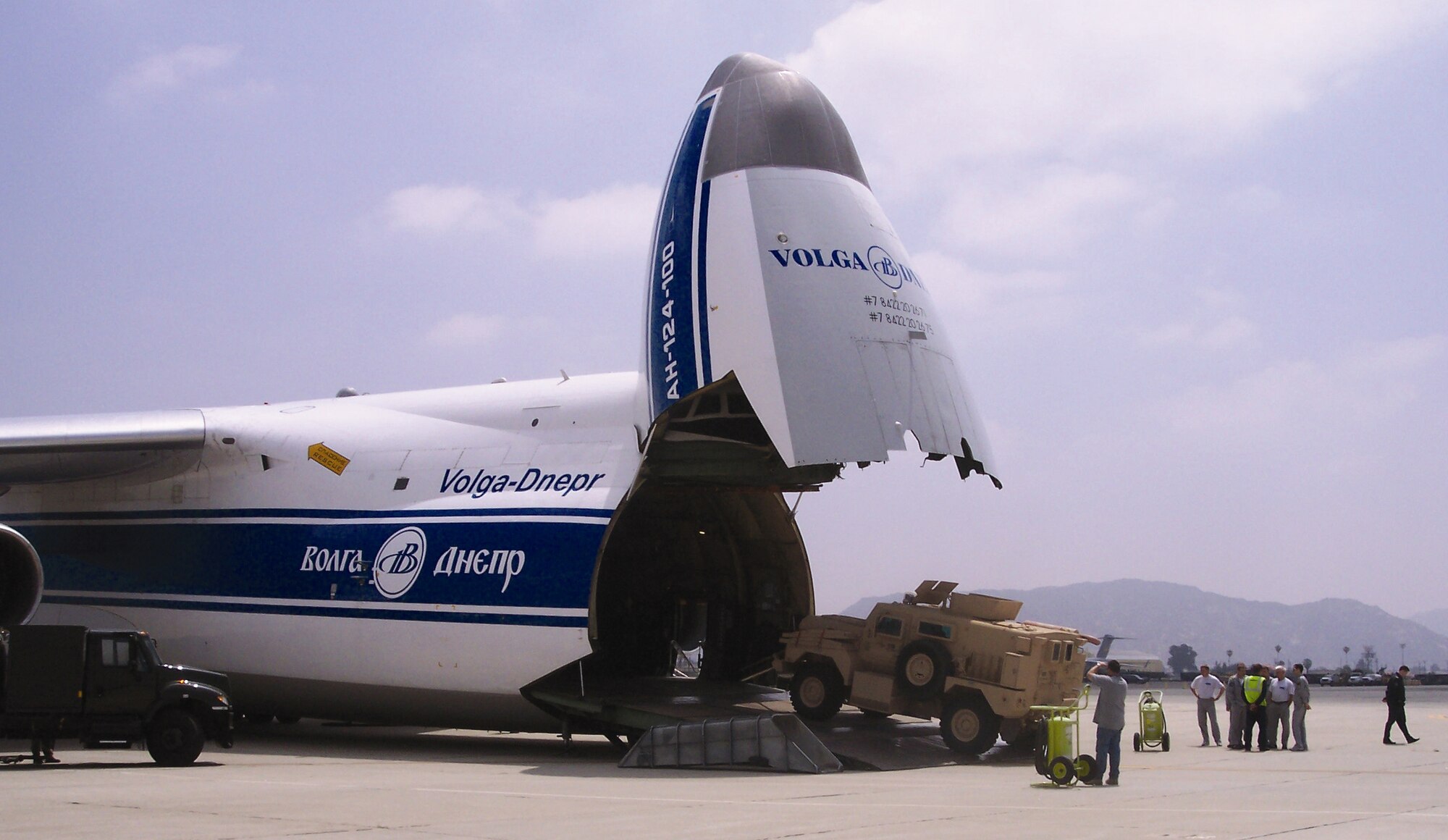 With coordination from the 452nd Aerial Port Support Flight, on May 22 the Antonov An-124 Ruslan, NATO reporting name Condor, uploads Joint Explosives Ordnance Disposal Rapid Response Vehicles (JERRVs) from Force Protection, Inc. here on the March flight line. The Cougar is a 12 ton mine protected armored patrol vehicle that has been used extensively to counter the Improvised Explosives Device (IED) threat in Iraq. Since the vehicle was first deployed in 2003, not a single Soldier or Marine has been killed while patrolling in a Cougar, despite more than 1,000 IED attacks on the vehicles. The 12-person APSF team is currently tasked to support the deployments and redeployments of Operations Enduring Freedom and Iraqi Freedom for all branches of services and agencies based in the Southern California region. (U.S. Air Force photo by Master Sgt. Philip Cheng)