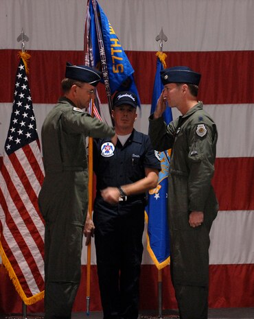 Lt. Col. Kevin Robbins relinquishes command of the U.S. Air Force Air Demonstration Squadron to Brig. Gen. Stephen Hoog, 57th Wing commander, in a ceremony held here, Jan. 11. (U.S. Air Force photo by Tech. Sgt. Justin Pyle)