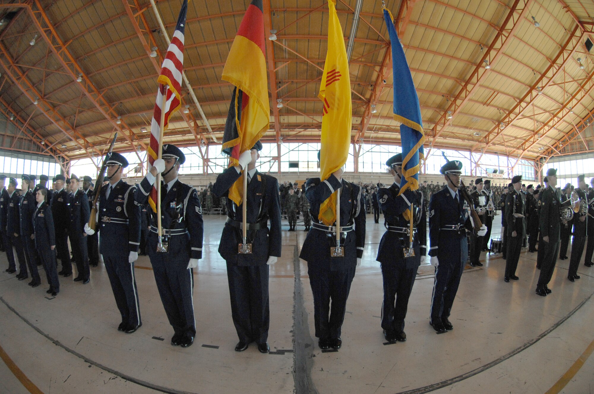 Members of the Honor Guard stand at attention during the 49th Fighter Wing change of command ceremony, Holloman Air Force Base, N.M. on Jan. 11, 2008. Col. Jeffrey Harrigian assumed command for Brig. Gen. David Goldfein. The ceremony was attended by members of Team Holloman and visitors from Alamogordo, White Sands and Las Cruces, N.M., and Fort Bliss, Texas. (U.S. Air Force photo/Senior Airman Anthony Nelson Jr) 