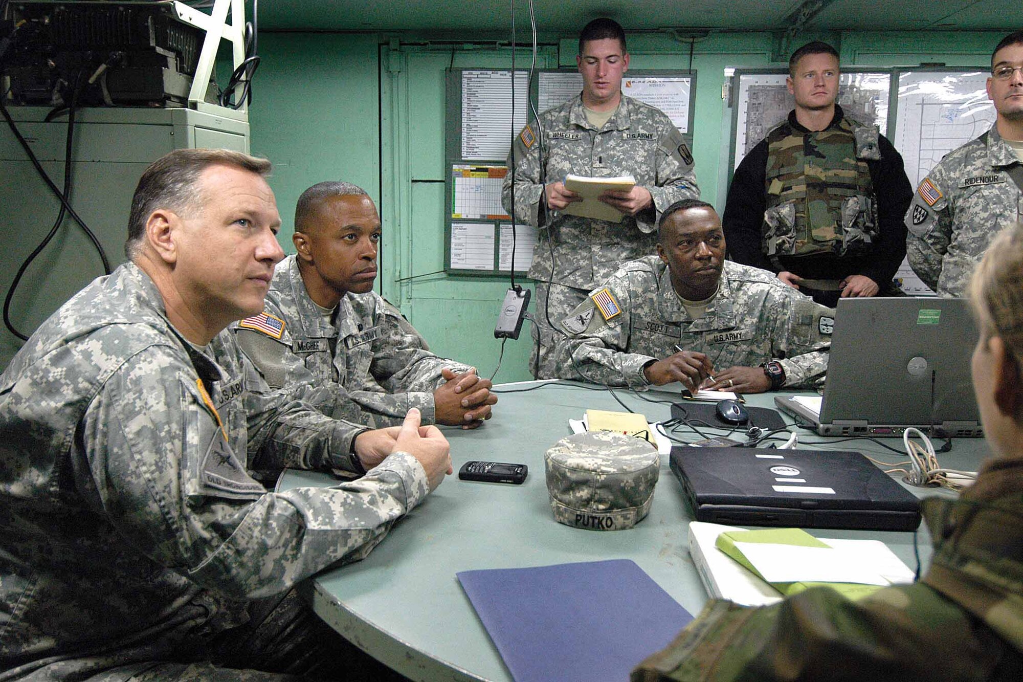 Army leadership, including Col. Christopher Putko, front, 31st Air Defense Artillery Brigade commander, are briefed on the exercise halfway through the two-week training. The group toured the area and were briefed frequently by Soldiers.  Command Sgt. Major Michael Banes said the Soldiers were getting “good, good training” here and added that future combined training opportunities were “only limited by our imagination”.  (Air Force photo by Margo Wright)
