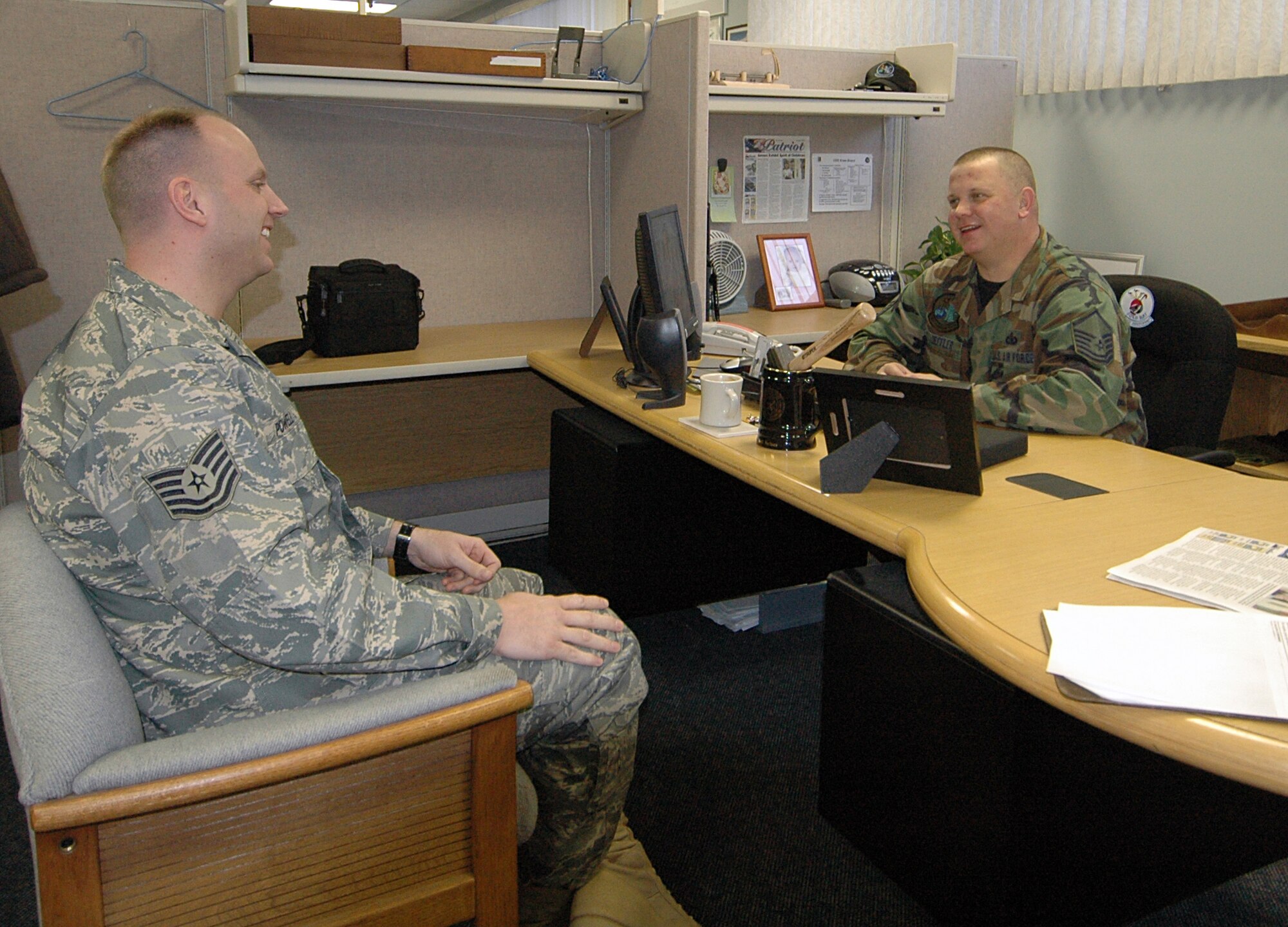 Master Sgt. Cary Loeffler, 28th Operations Support Squadron superintendent, counsels Tech. Sgt. James Powell, 28th Operations Group noncommissioned officer in charge of information management. Part of Sergeant Loeffler's responsibilities as superintendent is to oversee the proffessional developement of the enlisted force. (U.S. Air Force photo / Senior Airman Joshua Stevens)