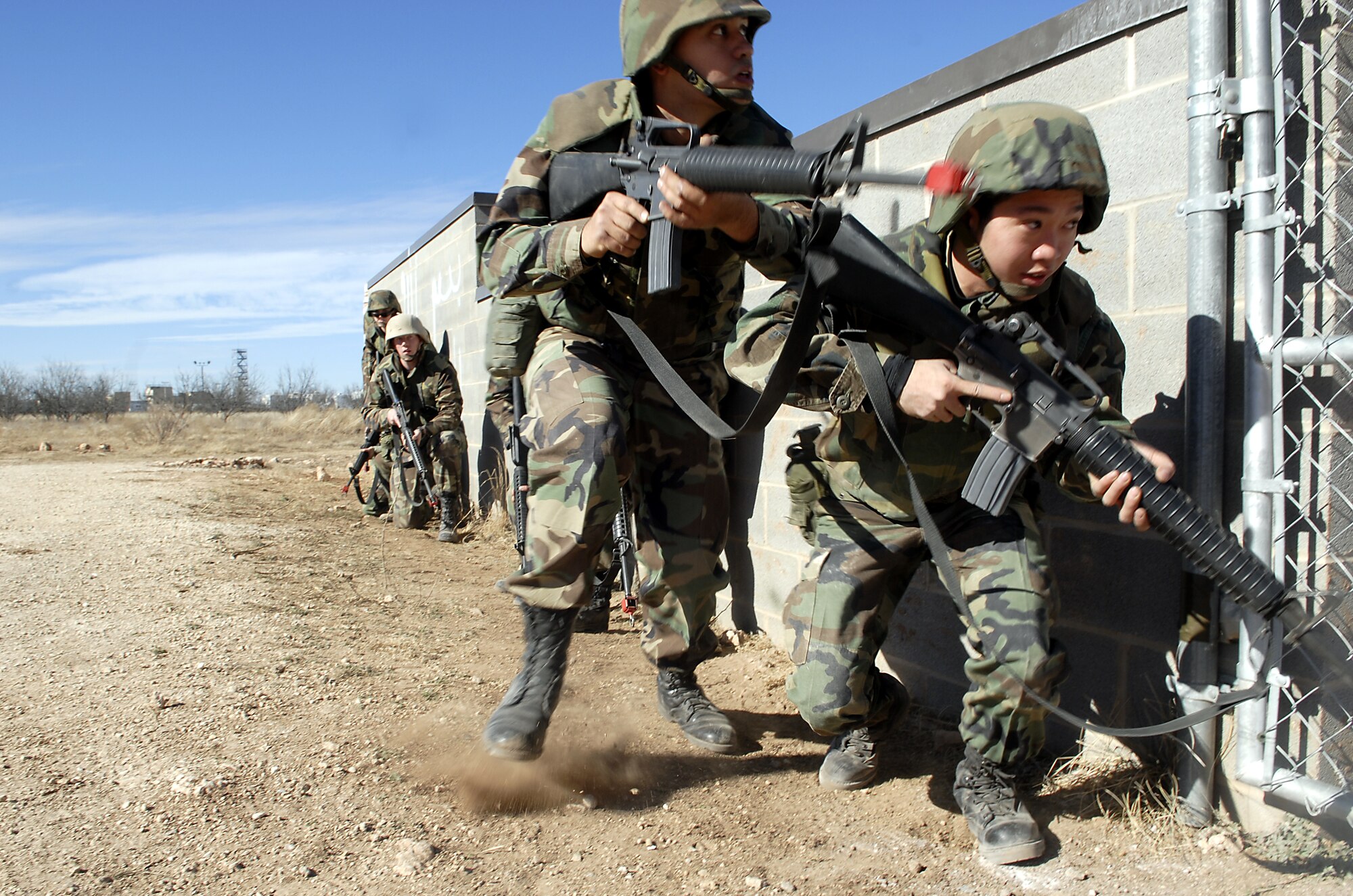 Members of Air Force Reserve Officer Training Corps Detachment 847 (Angelo State University) take part in building clearing during field training hosted at Goodfellow Air Force Base Jan. 9-11. (U.S. Air Force photo by Airman 1st Class Kamaile Chan).