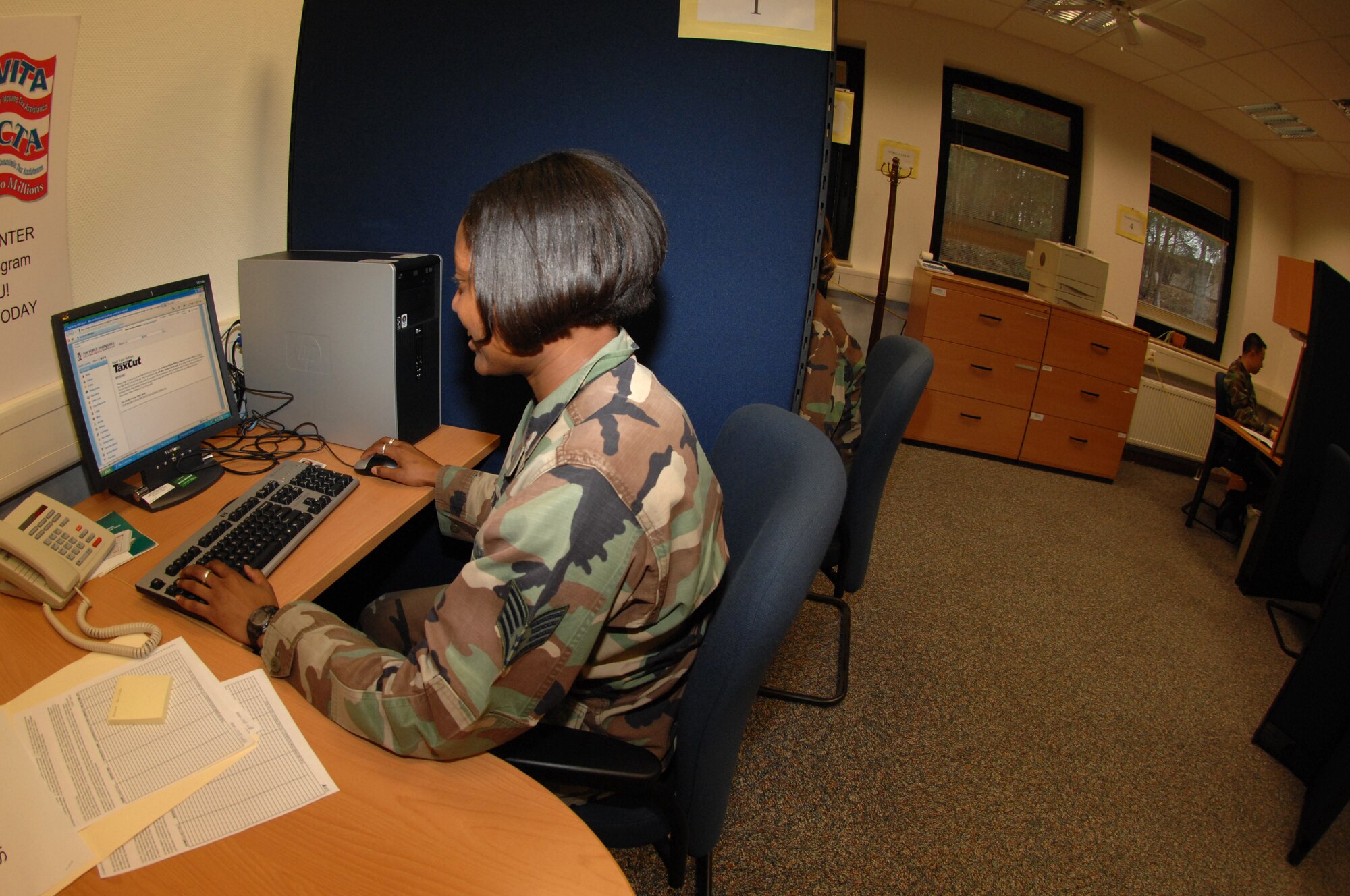 Staff Sgt. Kellie Ford, 435th Air Base Wing judge advocate, prepares to file her taxes Jan. 18. The new tax center opens on January 23 for servicemembers to walk in and do their own taxes.  (U.S. Air Force photo by Airman 1st Class Amber Bressler)(RELEASED)

