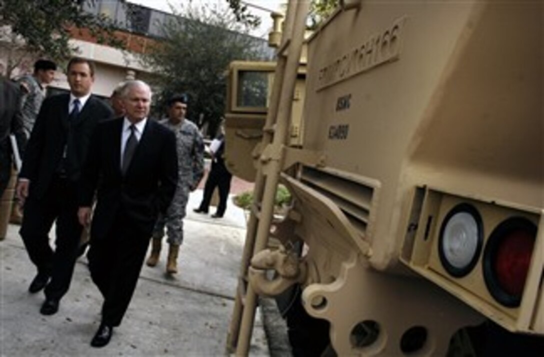 Defense Secretary Robert M. Gates gets a firsthand look at the different variations of MRAPs being produced during a visit to the Space and Naval Warfare Systems Center in Charleston, S.C., Jan. 18, 2008.  
