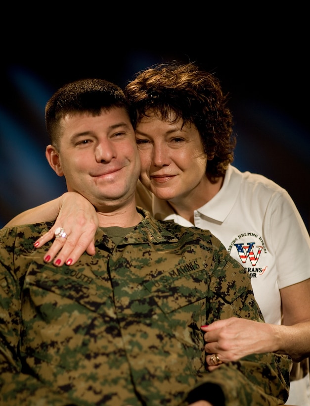 WASHINGTON – Sgt. Klay South with help from this mother Janet launched Veterans of Valor on October 4, 2007. South was wounded November 2004 and spent a long recovery process to reconstruct his face and jaw after being shot in the face with an AK-47. Veterans of Valor visited Bethesda Naval Hospital and Walter Reed Army Medical Center January 17 to give backpacks and words of encouragement to wounded service members.::n::Photo by Staff Sgt. Leo A. Salinas::n::