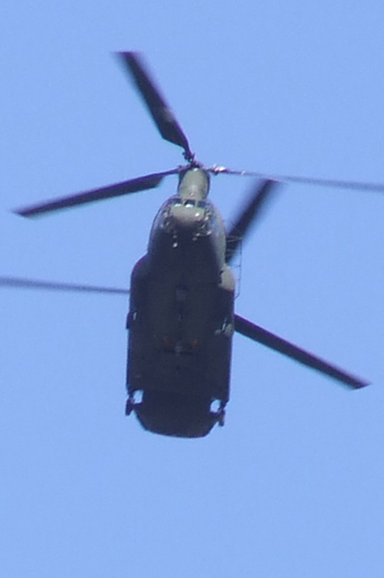A CH-47 Chinook from Detachment 1, Company G, 104th Aviation Battalion of the Connecticut Army National Guard at Windsor Locks, flies over Naval Air Engineering Station Lakehurst, N.J. as part of an event for Air Force Exercise Eagle Flag 08-2 Jan. 16.  The effort was part of a joint operations event for the exercise.  The exercise is operated by the U.S. Air Force Expeditionary Center's 421st Combat Training Squadron at Fort Dix, N.J.  (U.S. Air Force Photo/Tech. Sgt. Scott T. Sturkol)