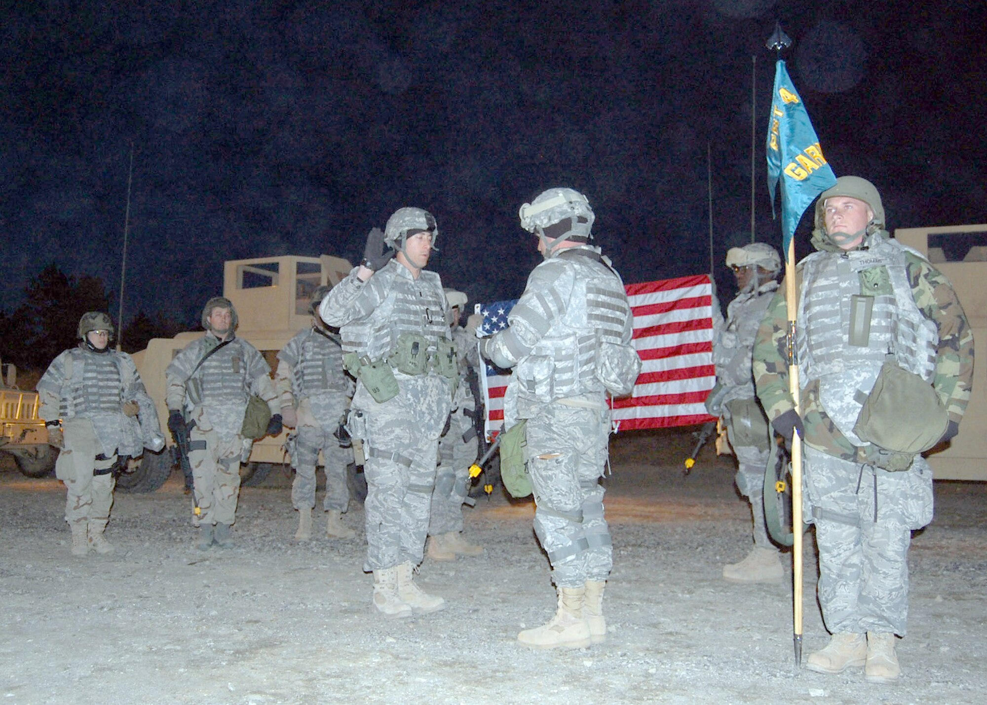 FORT BRAGG, N.C. - Capt. Trevor Ambron swears his oath of office before Lt. Col. Brett Sharp who commands the incoming Provincial Reconstruction Team Gardez. Captain Ambron deployed from Shaw Air Force Base, S.C., is serving as Provincial Reconstruction Team Gardez’ Physician Assistant,; and Colonel Sharp deployed from Headquarters, Air Combat Command at Langley AFB, Va., to command PRT Gardez. The PRT will deploy early this spring for a year in Afghanistan. (U.S. Air Force photo/Capt. Ken Hall)