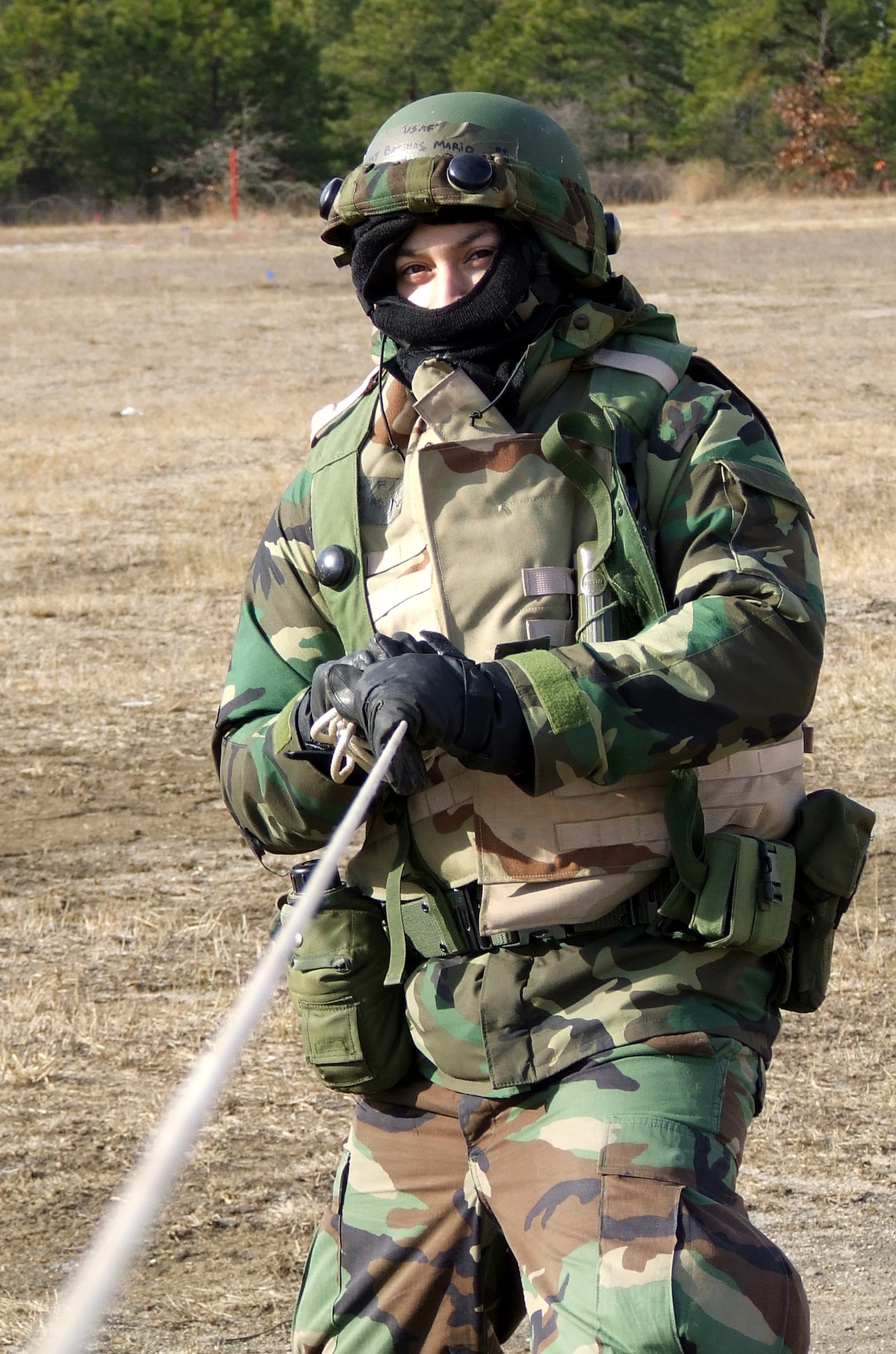 Staff Sgt. Mario Barillas, Peterson Air Force Base, Colo., pulls on a rope while assembling a tent during operations for Air Force Exercise Eagle Flag 08-2 at Naval Air Engineering Station Lakehurst, N.J., Jan. 20.  Sergeant Barrillas is one of nearly 400 Airmen participating in the exercise.  The exercise is operated by the U.S. Air Force Expeditionary Center's Expedtionary Operations School and 421st Combat Training Squadron from Fort Dix, N.J.  (U.S. Air Force Photo/Tech. Sgt. Scott T. Sturkol)