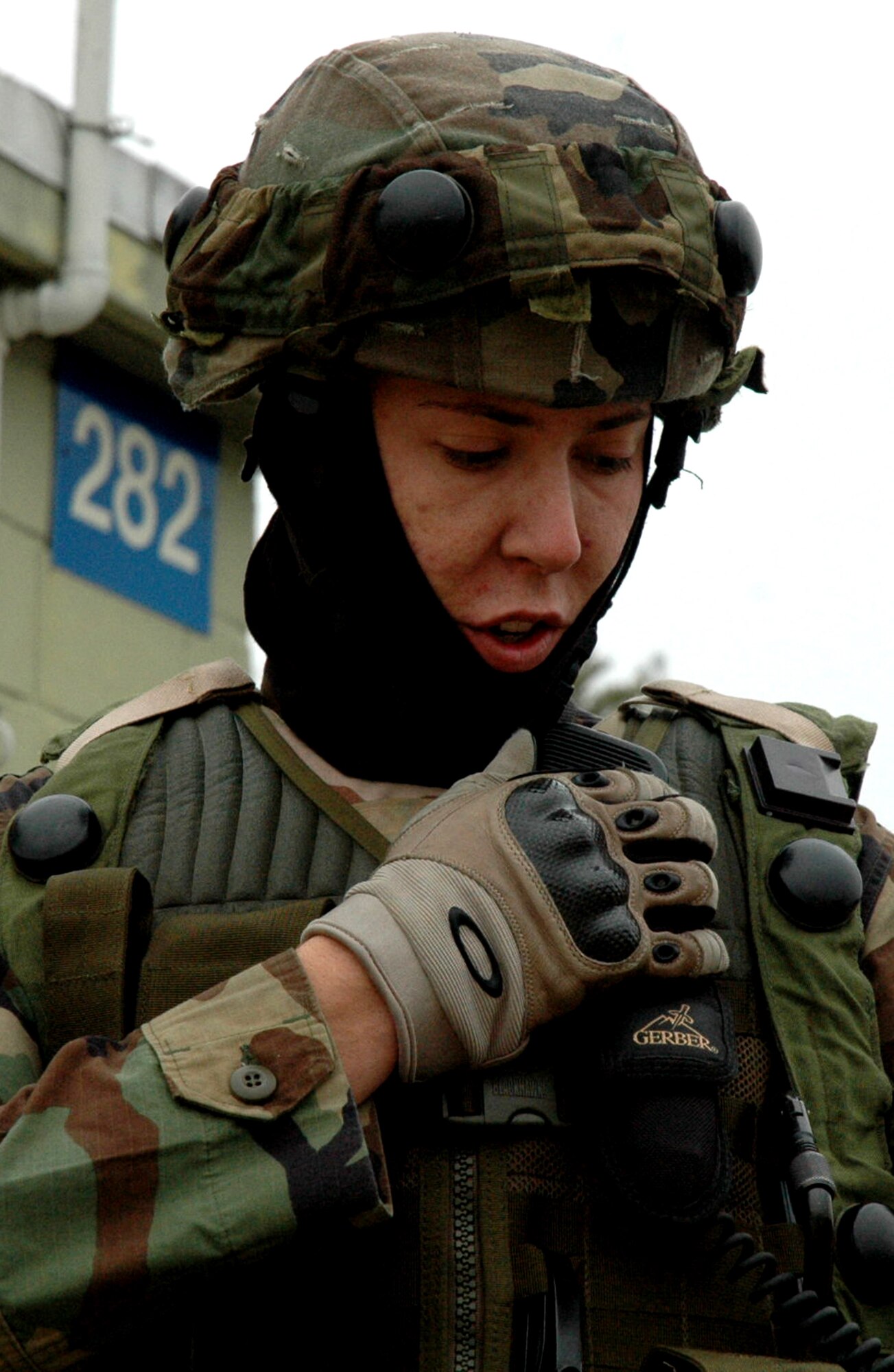 Senior Airman Matthew Bridge, from the 60th Security Forces Squadron at Travis Air Force Base, Calif., supporting the 570th Contingency Response Group, also from Travis, calls on his radio during operations for Air Force Exercise Eagle Flag 08-2 Jan. 19 at Naval Air Engineering Station Lakehurst, N.J.  The exercise is operated by the U.S. Air Force Expeditionary Center's Expeditionary Operations School and 421st Combat Training Squadron from Fort Dix, N.J.  (U.S. Air Force Photo/Tech. Sgt. Scott T. Sturkol)