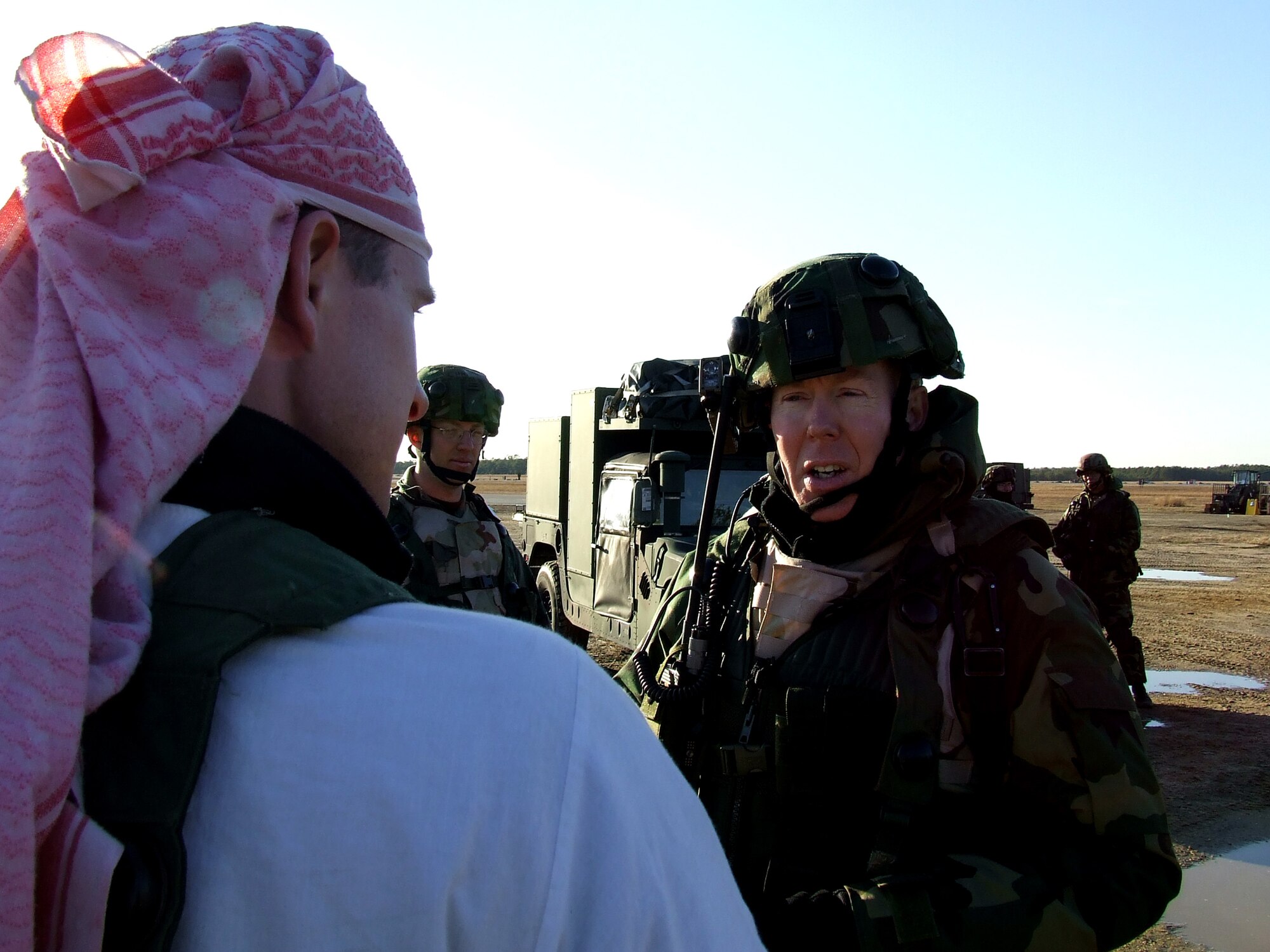 Col. Steve Jordan, commander of the 570th Contingency Response Group, Travis Air Force Base, Calif., talks to "local media" during a scenario for Air Force Exercise Eagle Flag 08-2 at Naval Air Engineering Station Lakehurst, N.J., Jan. 18.  Colonel Jordan was among the first students in the field for the exercise.  (U.S. Air Force Photo/Tech. Sgt. Scott T. Sturkol)