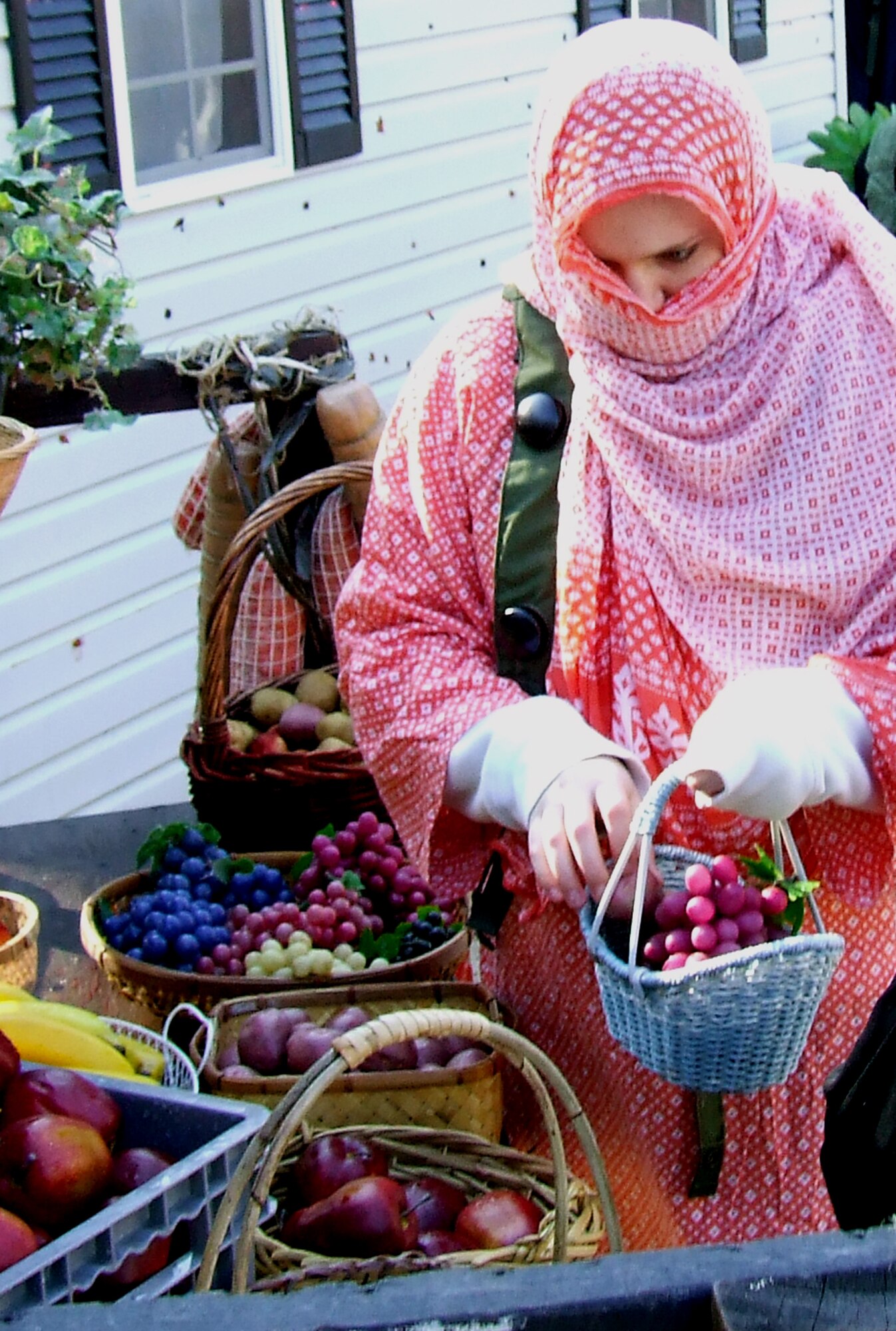 A role player for Air Force Exercise Eagle Flag 08-2 prepares fake fruit in the fictional village of "Citheron" while preparing for a scenario for the exercise Jan. 18 at Naval Air Engineering Station Lakehurst, N.J.  The exercise is operated by the U.S. Air Force Expeditionary Center's Expeditionary Operations School and 421st Combat Training Squadron from Fort Dix, N.J.  (U.S. Air Force Photo/Tech. Sgt. Scott T. Sturkol)