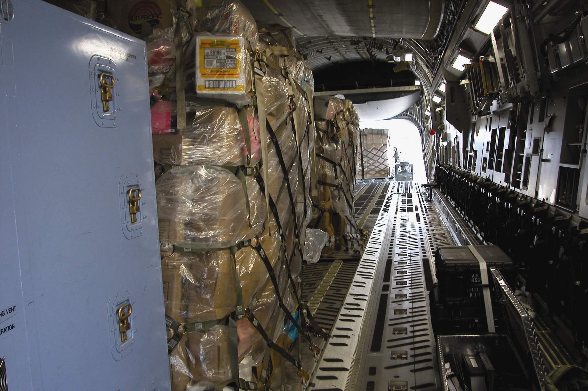 On Jan. 3, in conjunction with the support of Operation Enduring Freedom, the 452nd Aerial Port Support Flight and 50th / 56th Aerial Port Squadrons personnel assisted with the upload of ten pallets (15 short-tons) of much-needed medical supplies onto a C-17 from the 729th Airlift Squadron. The Denton cargo was headed for Andrews Air Force Base, Md., with a final destination at Bagram Air Base, Afghanistan. The Denton program allows the Department of Defense to provide space available transportation of humanitarian cargo at little or no cost to the donor. This
is accomplished by utilizing U.S. military transportation exclusively. Authority to transport the cargo comes from the Denton Amendment program which allows donors to use space available on military cargo planes to transport goods to countries in need. The Department of State and DOD manage the program jointly. (U.S. Air Force photos by LaGina Jackson)