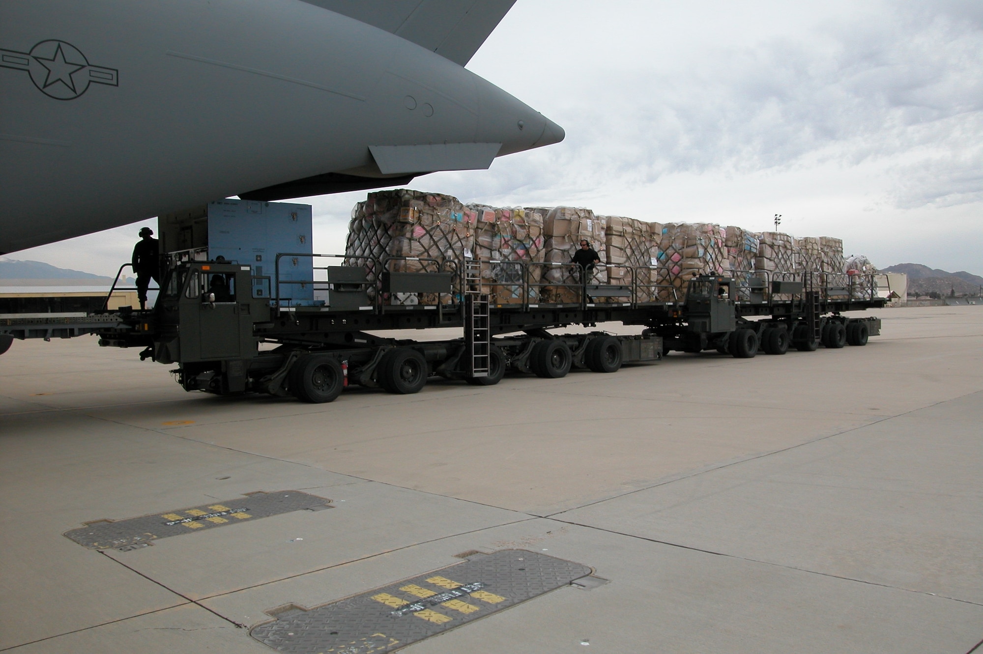 On Jan. 3, in conjunction with the support of Operation Enduring Freedom, the 452nd Aerial Port Support Flight and 50th / 56th Aerial Port Squadrons personnel assisted with the upload of ten pallets (15 short-tons) of much-needed medical supplies onto a C-17 from the 729th Airlift Squadron. The Denton cargo was headed for Andrews Air Force Base, Md., with a final destination at Bagram Air Base, Afghanistan. The Denton program allows the Department of Defense to provide space available transportation of humanitarian cargo at little or no cost to the donor. This
is accomplished by utilizing U.S. military transportation exclusively. Authority to transport the cargo comes from the Denton Amendment program which allows donors to use space available on military cargo planes to transport goods to countries in need. The Department of State and DOD manage the program jointly. (U.S. Air Force photos by LaGina Jackson)