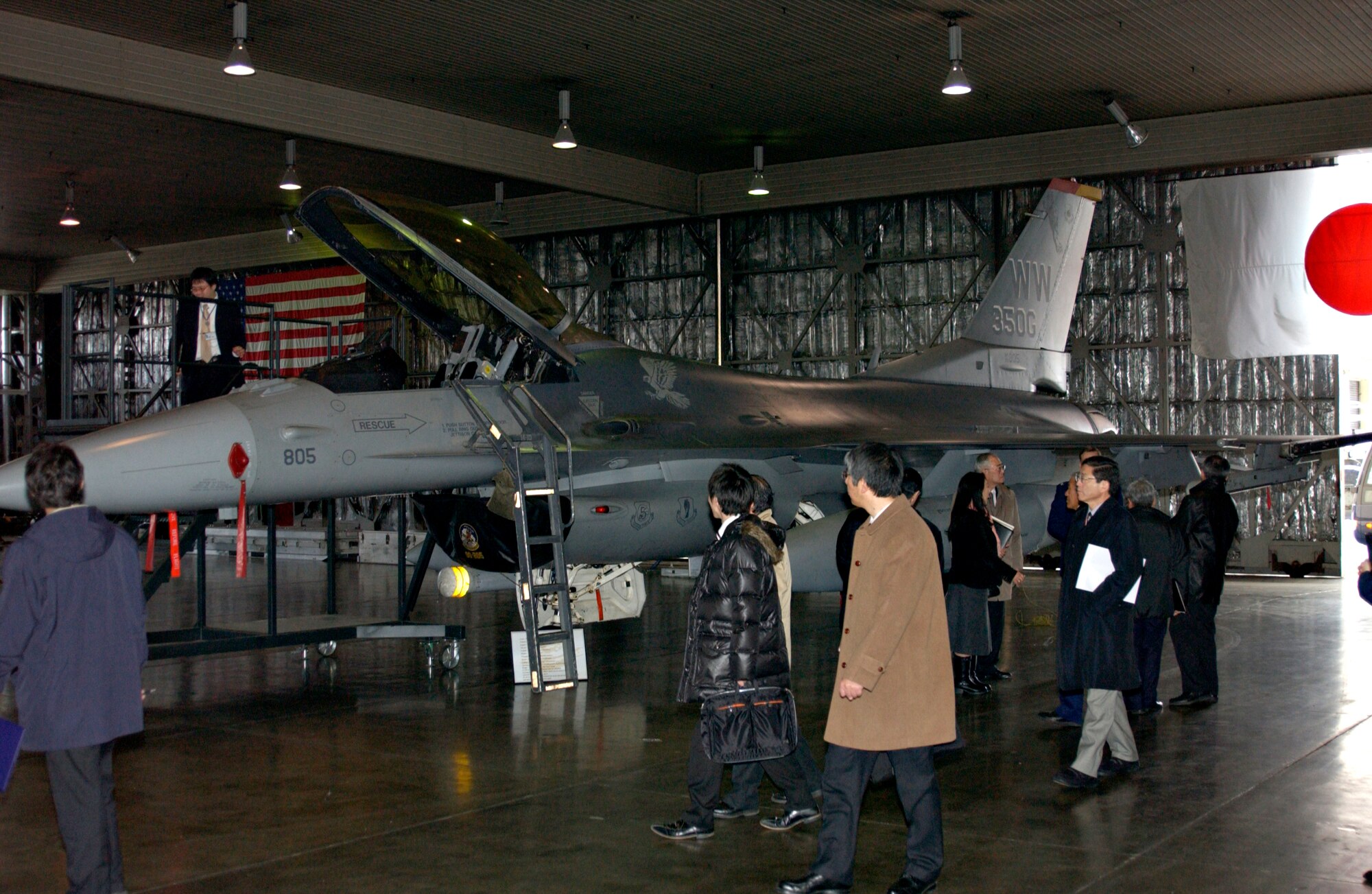 MISAWA AIR BASE, Japan -- Local mayors and other city officials from the Liaison Committee view the F-16 static display in Hangar 911 on Jan. 22, 2008. The committee is made up of ten local mayors in Misawa City and its surrounding communities. (U.S. Air Force photo by Airman 1st Class Eric Harris)