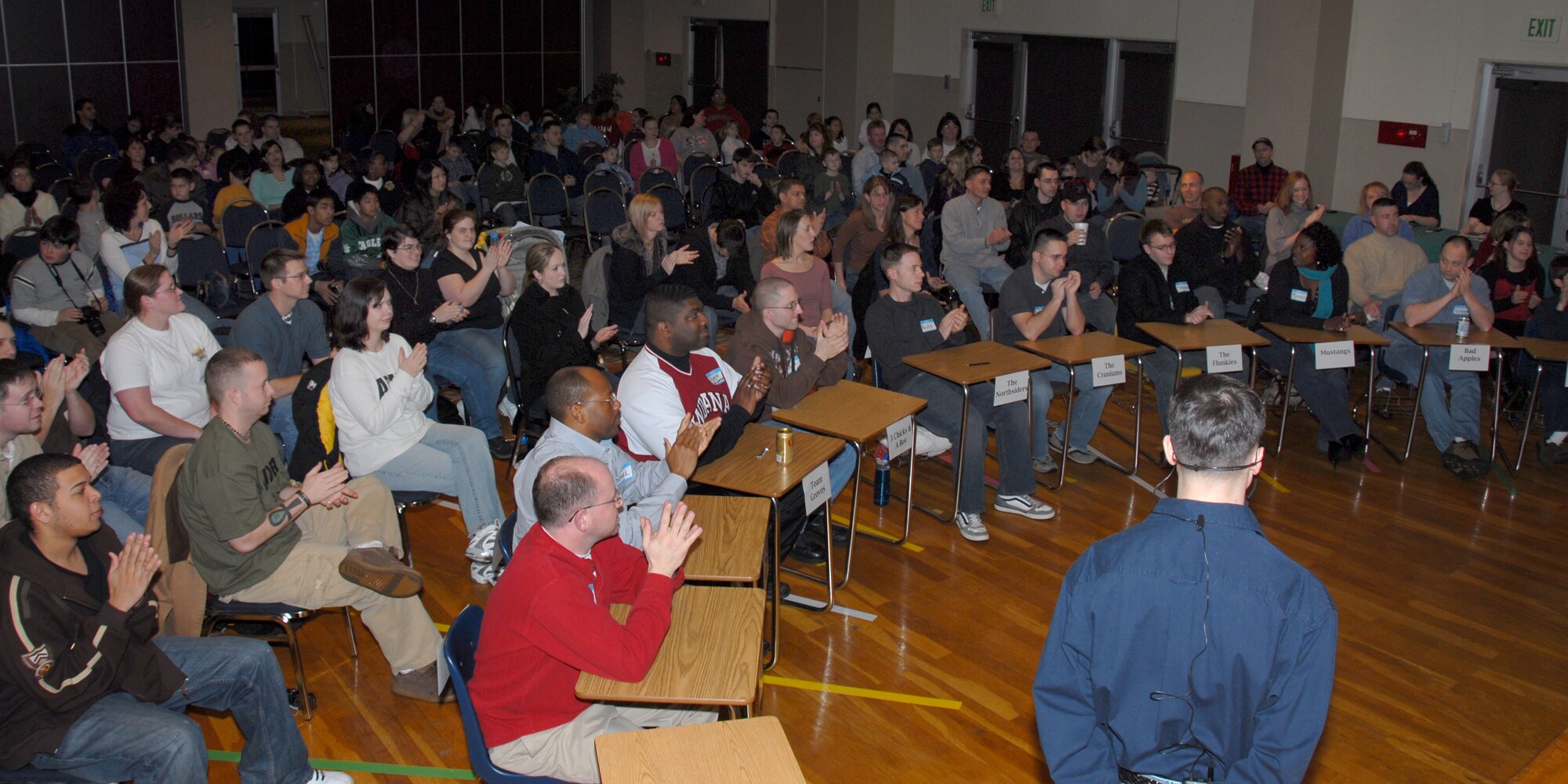 MISAWA AIR BASE, Japan -- Ten teams take their place on the stage, with audience members in the background, for the first "Are You Smarter Than A 5th Grader" contest at the Mokuteki Community Center Jan. 19, 2008. The contest was a slightly altered version of the popular television show. (U.S. Air Force photo by Staff Sgt. Rachel Martinez) 