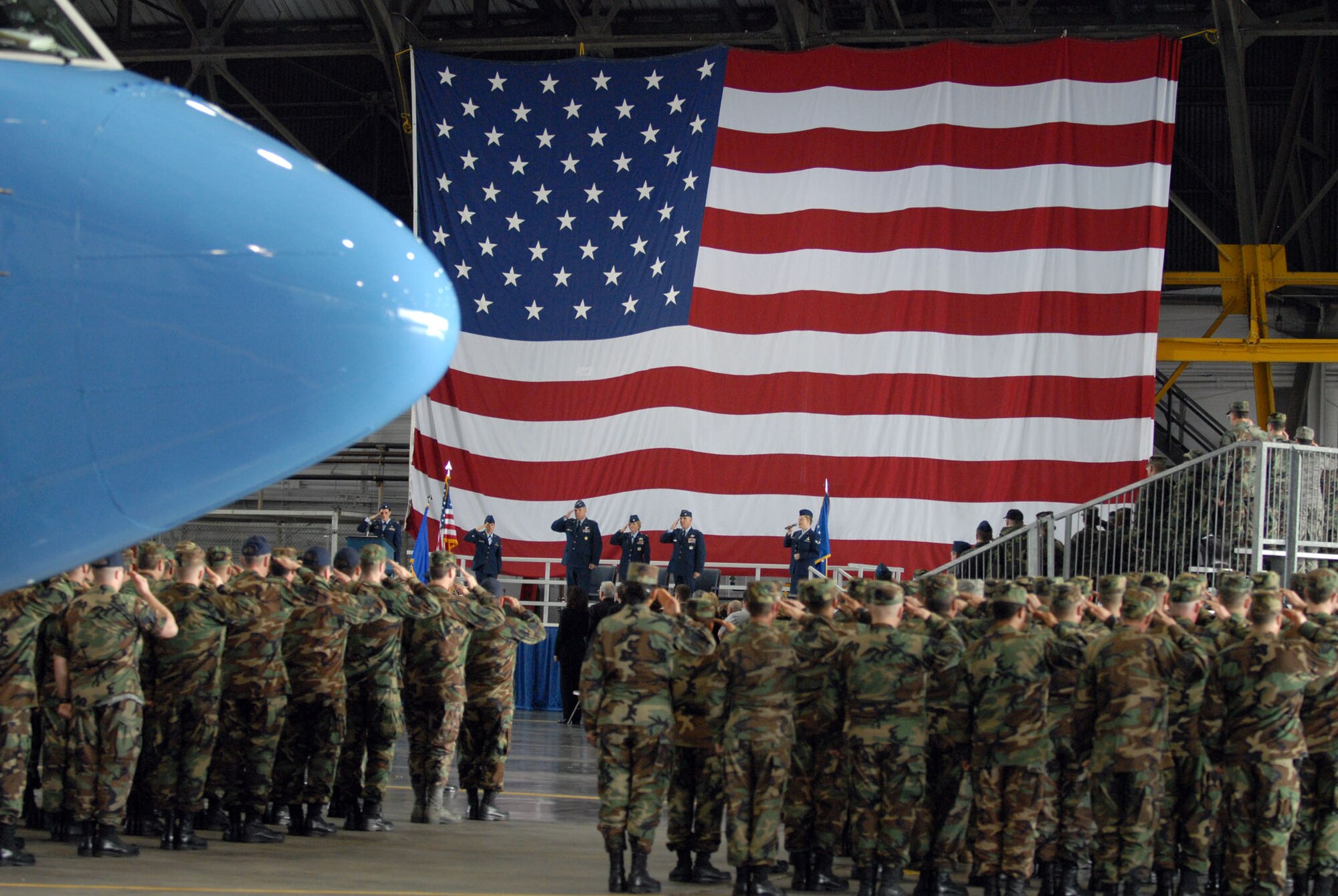 The nosecone of a C-40C plane pokes into the frame as Colonel John (Jay) C. Flournoy Jr. becomes the new 932nd Airlift Wing commander as of January 6, 2008.

His arrival at Scott AFB is a homecoming of sorts. His father was assigned to the southern Illinois base three times. "When asked where I'm from, I tell people I was born in Alabama, but I consider Scott AFB my home town," said Colonel Flournoy. Throughout those assignments, he attended Scott AFB elementary schools and Mascoutah High School in Mascoutah, Ill., for much of his early life. He graduated from Southern Illinois University at Edwardsville, Ill., where he also graduated from the Reserve Officer Training Corps. He entered the Air Force in 1986. 

While on active duty, he served as a B-52 pilot and as a T-37 instructor pilot. He joined the Air Force Reserve in 1991 as an HH-60G Blackhawk helicopter pilot and became an Air Reserve Technician in 1994. 

Colonel Flournoy returned to active duty in July of 1999 where he served in the Reserve Operations and Requirements Division, as well as the Reserve Studies and Programs Division of the Air Staff. Following his tour at the Pentagon he attended National War College at the National Defense University in Washington D.C. Colonel Flournoy was deployed as Operations Group Commander of the 386th EOG Ali Al Salem, Kuwait.  Photo/Tech. Sgt. Chris Parr