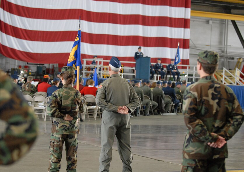 The 932nd Airlift Wing Airmen stand as parade rest as they assembled inside the hangar before the start of ceremonies welcoming Col. John (Jay) C. Flournoy, Jr., as their new commander.  Photo/Tech Sgt. Chris Parr