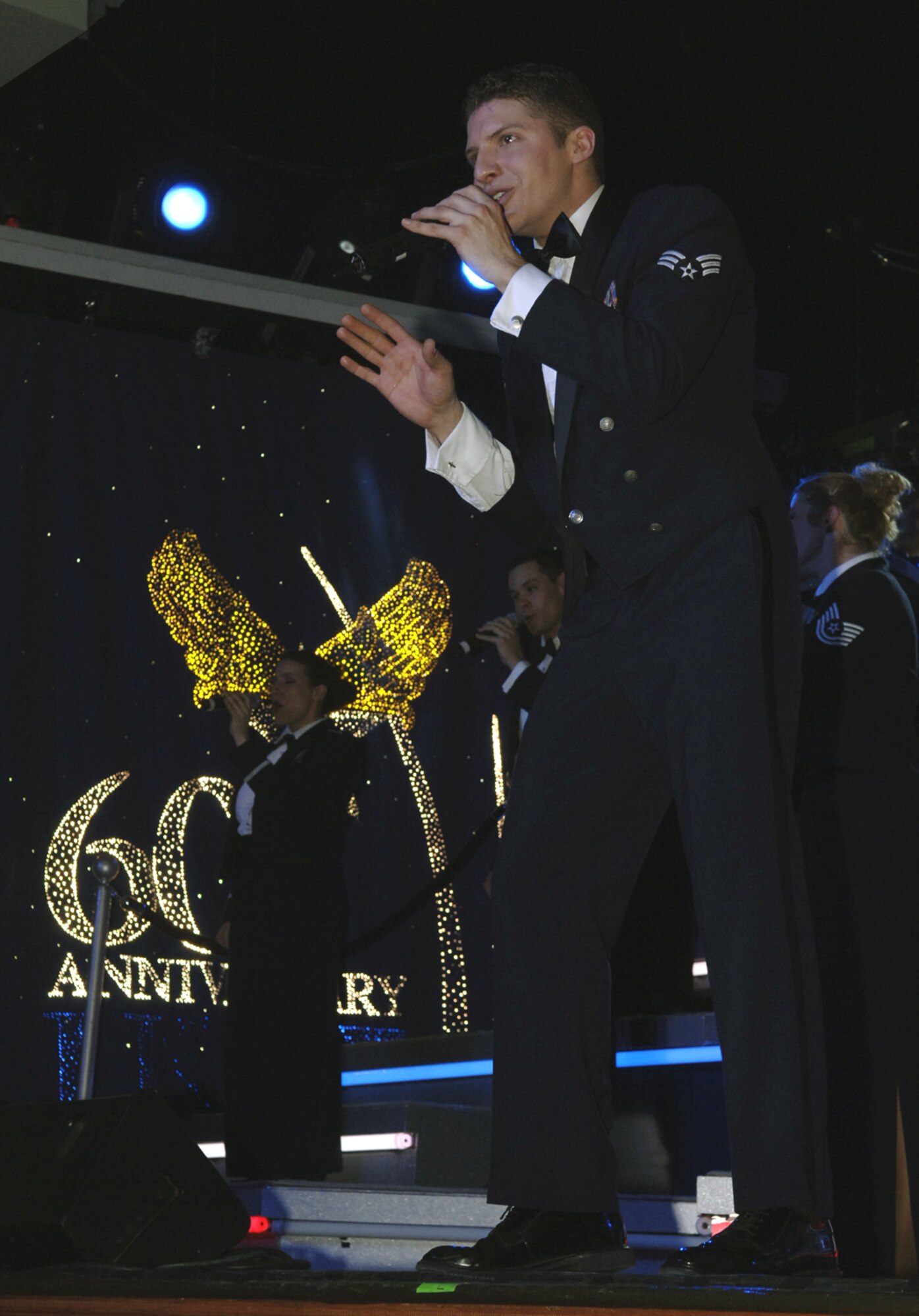 FAIRCHILD AIR FORCE BASE, Wash. –Senior Airman Jonathan Hayden, a member of the Air Force’s expeditionary entertainment unit, Tops in Blue, performs a tribute to the Air Force’s 60th Anniversary at Northern Quest Casino on Jan 17. "The Fly By" theme celebrated 60 years of Air Force history. Tops in Blue is an all active-duty special unit comprised of 35 talented vocalists, musicians and dancers. (U.S. Air Force photo/Airman 1st Class Darlene West)